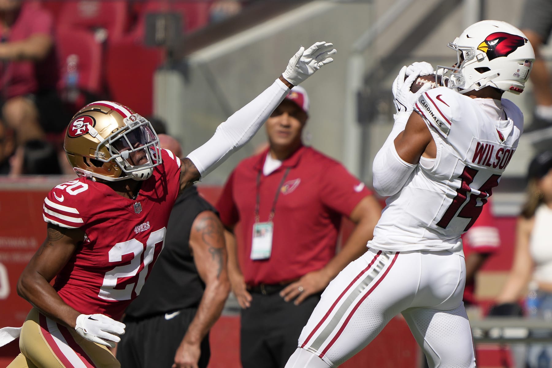 SANTA CLARA, CALIFORNIA - OCTOBER 01: Michael Wilson #14 of the Arizona Cardinals makes a reception against Ambry Thomas #20 of the San Francisco 49ers during the second quarter at Levi's Stadium on October 01, 2023 in Santa Clara, California. (Photo by Thearon W. Henderson/Getty Images)