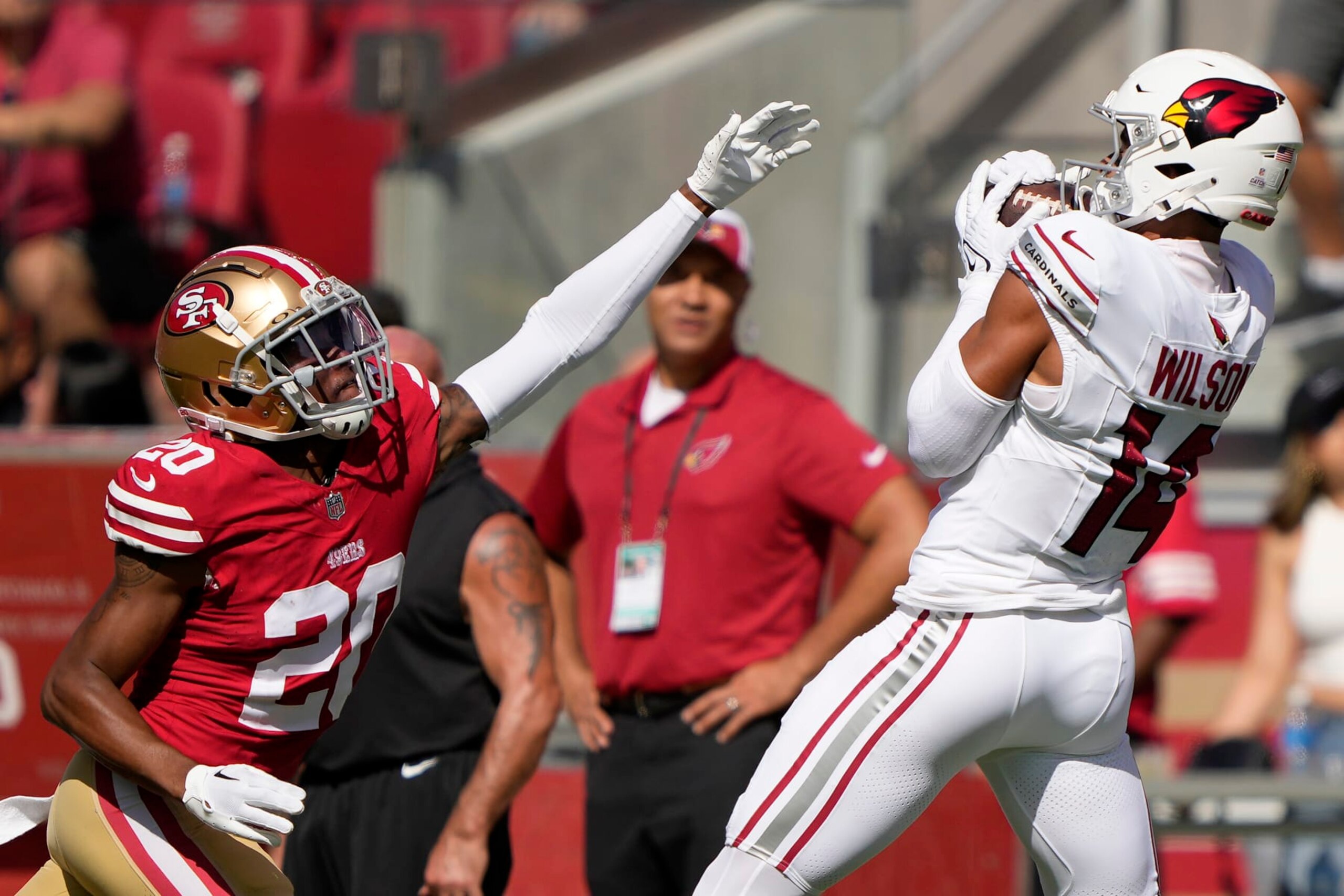 SANTA CLARA, CALIFORNIA - OCTOBER 01: Michael Wilson #14 of the Arizona Cardinals makes a reception against Ambry Thomas #20 of the San Francisco 49ers during the second quarter at Levi's Stadium on October 01, 2023 in Santa Clara, California. (Photo by Thearon W. Henderson/Getty Images)