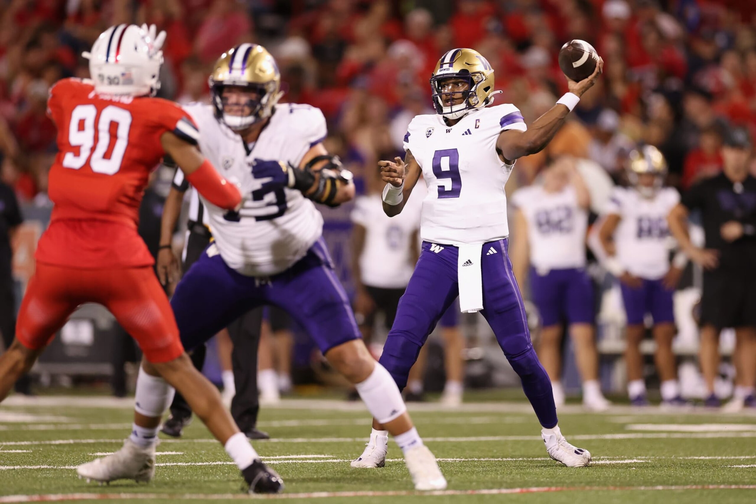 TUCSON, ARIZONA - SEPTEMBER 30: Quarterback Michael Penix Jr. #9 of the Washington Huskies throws a pass during the second half of the NCAAF game against the Arizona Wildcats at Arizona Stadium on September 30, 2023 in Tucson, Arizona. (Photo by Christian Petersen/Getty Images)