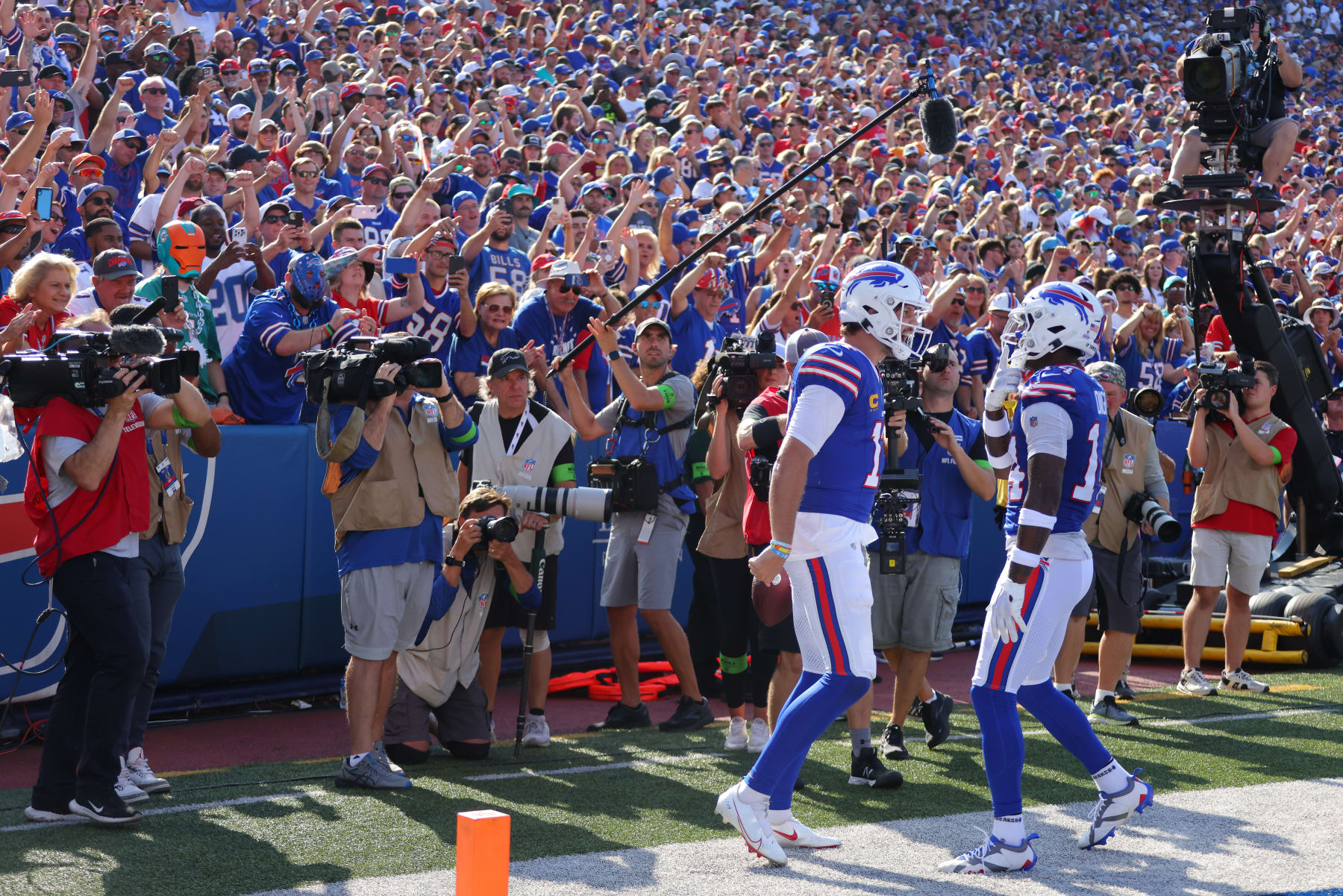 ORCHARD PARK, NEW YORK - OCTOBER 01: Josh Allen #17 of the Buffalo Bills celebrates his touchdown run against the Miami Dolphins with Stefon Diggs #14 during the fourth quarter at Highmark Stadium on October 01, 2023 in Orchard Park, New York. (Photo by Timothy T Ludwig/Getty Images)