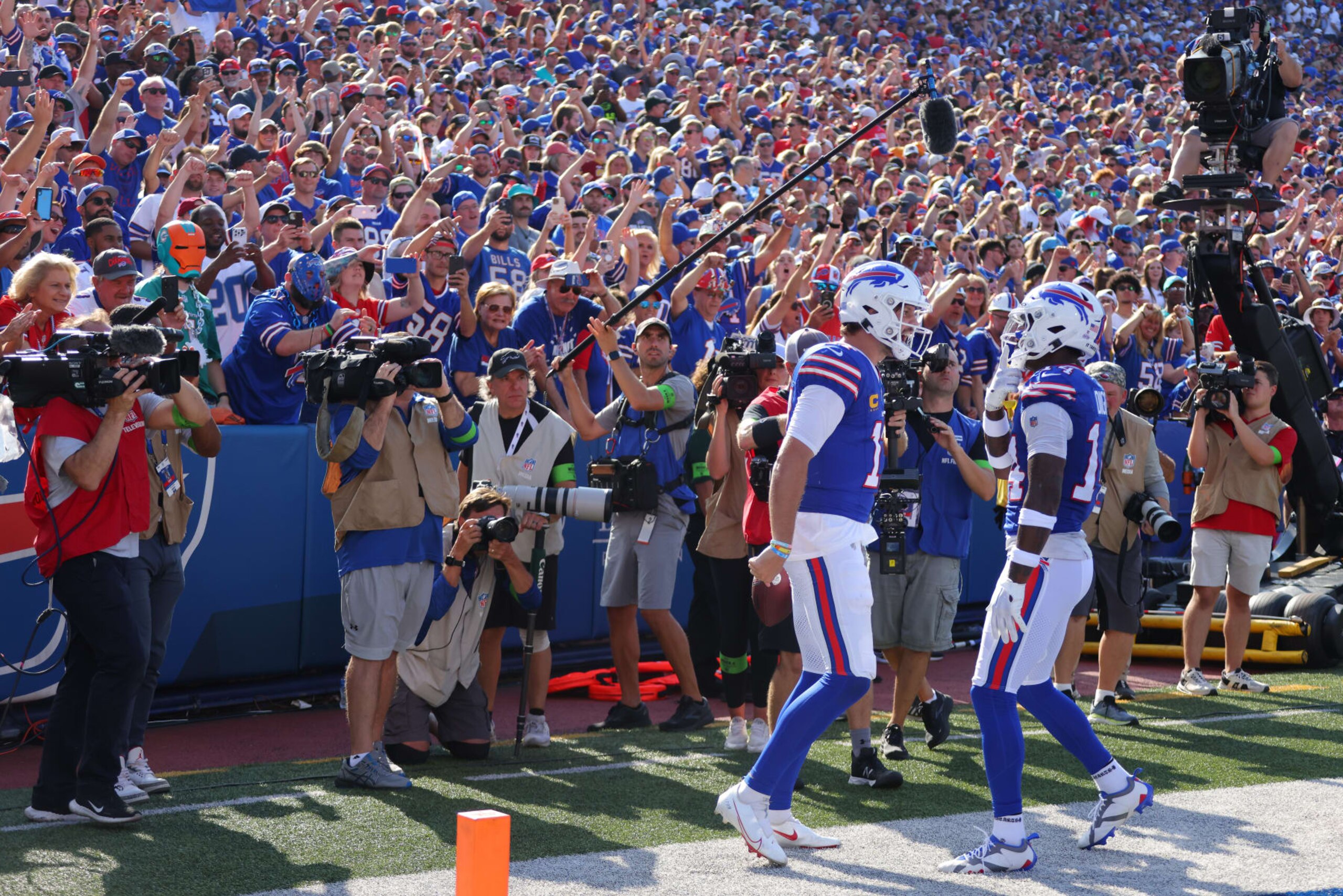 ORCHARD PARK, NEW YORK - OCTOBER 01: Josh Allen #17 of the Buffalo Bills celebrates his touchdown run against the Miami Dolphins with Stefon Diggs #14 during the fourth quarter at Highmark Stadium on October 01, 2023 in Orchard Park, New York. (Photo by Timothy T Ludwig/Getty Images)
