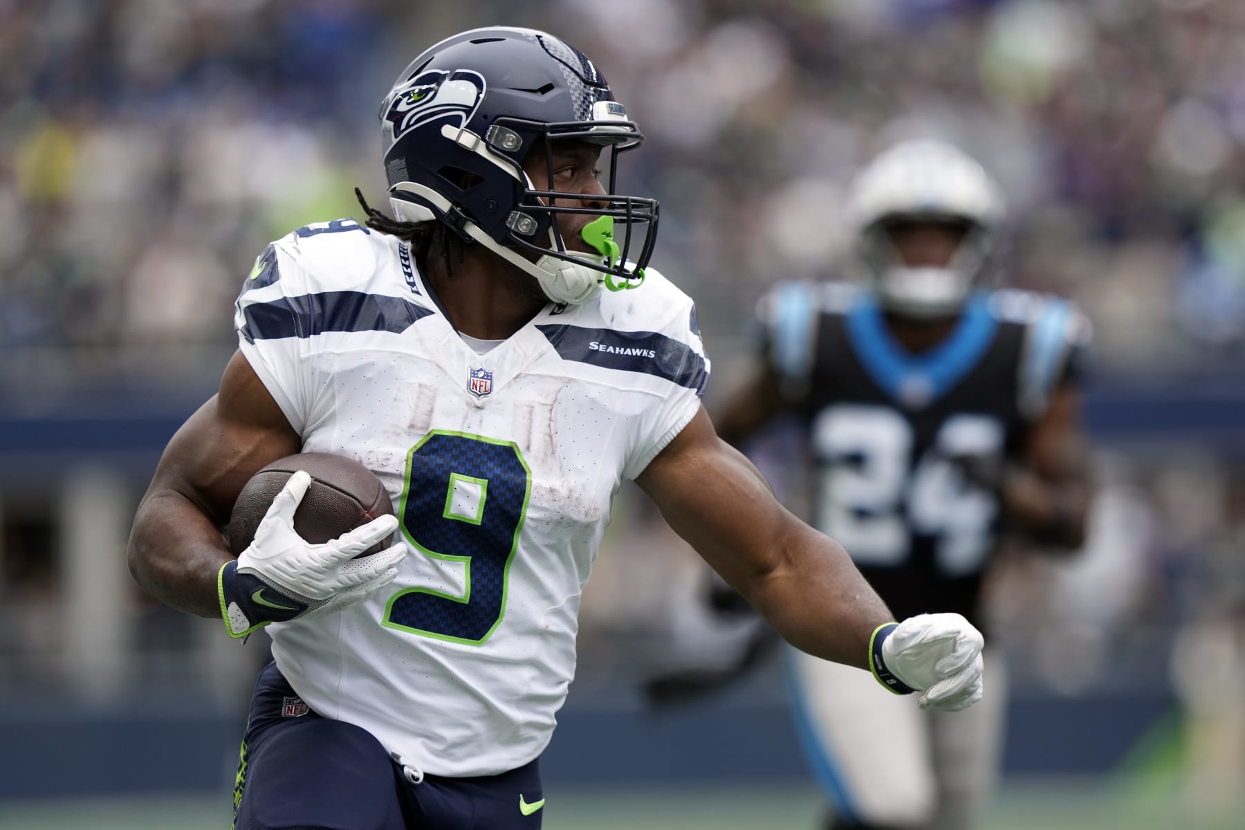 SEATTLE, WASHINGTON - SEPTEMBER 24: Kenneth Walker III #9 of the Seattle Seahawks runs the ball during the second quarter against the Carolina Panthers at Lumen Field on September 24, 2023 in Seattle, Washington. (Photo by Christopher Mast/Getty Images)