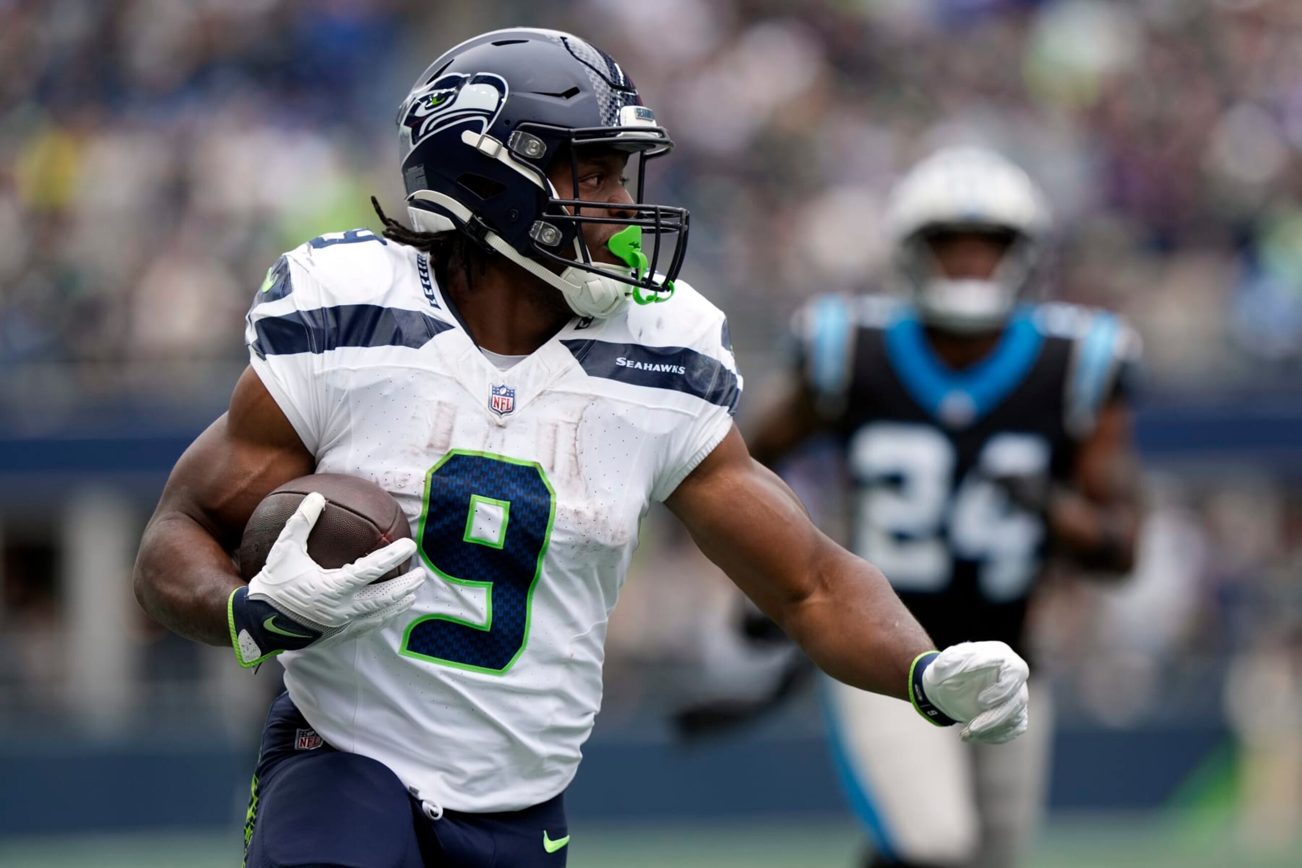 SEATTLE, WASHINGTON - SEPTEMBER 24: Kenneth Walker III #9 of the Seattle Seahawks runs the ball during the second quarter against the Carolina Panthers at Lumen Field on September 24, 2023 in Seattle, Washington. (Photo by Christopher Mast/Getty Images)
