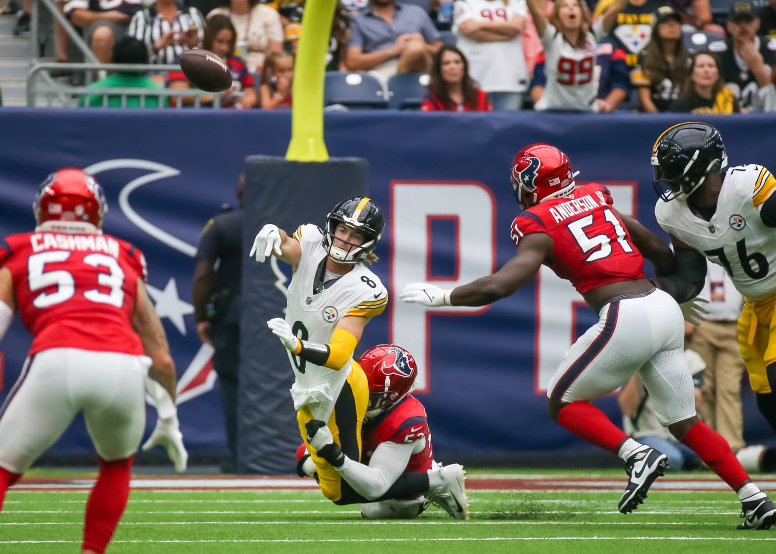 HOUSTON, TX - OCTOBER 01:  Houston Texans defensive end Jonathan Greenard (52) sacks Pittsburgh Steelers quarterback Kenny Pickett (8) in the first quarter during the NFL game between the Pittsburgh Steelers and Houston Texans on October 1, 2023 at NRG Stadium in Houston, Texas.  (Photo by Leslie Plaza Johnson/Icon Sportswire via Getty Images)