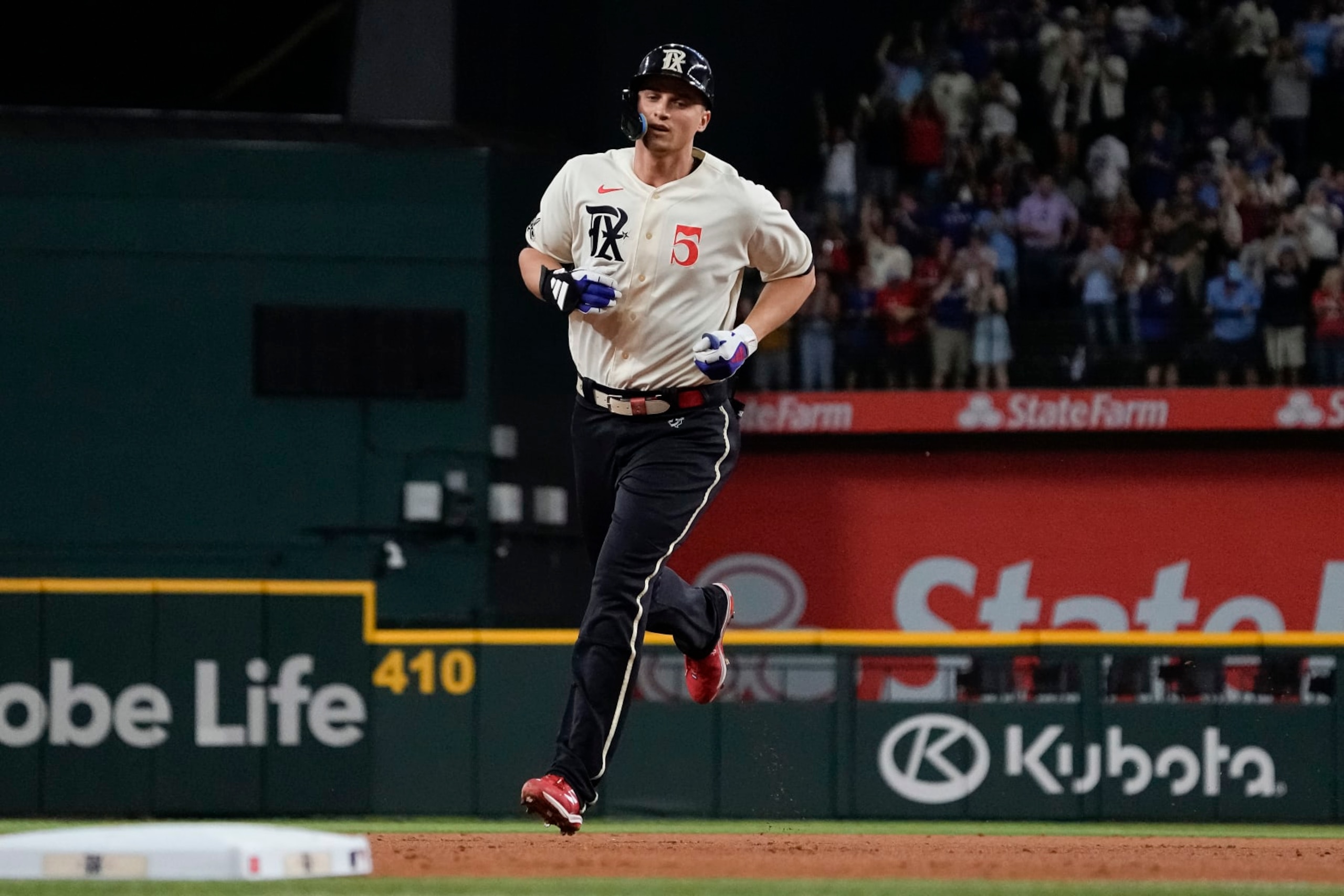ARLINGTON, TEXAS - SEPTEMBER 22: Corey Seager #5 of the Texas Rangers runs the bases on his first inning solo home run against the Seattle Mariners at Globe Life Field on September 22, 2023 in Arlington, Texas. (Photo by Sam Hodde/Getty Images)