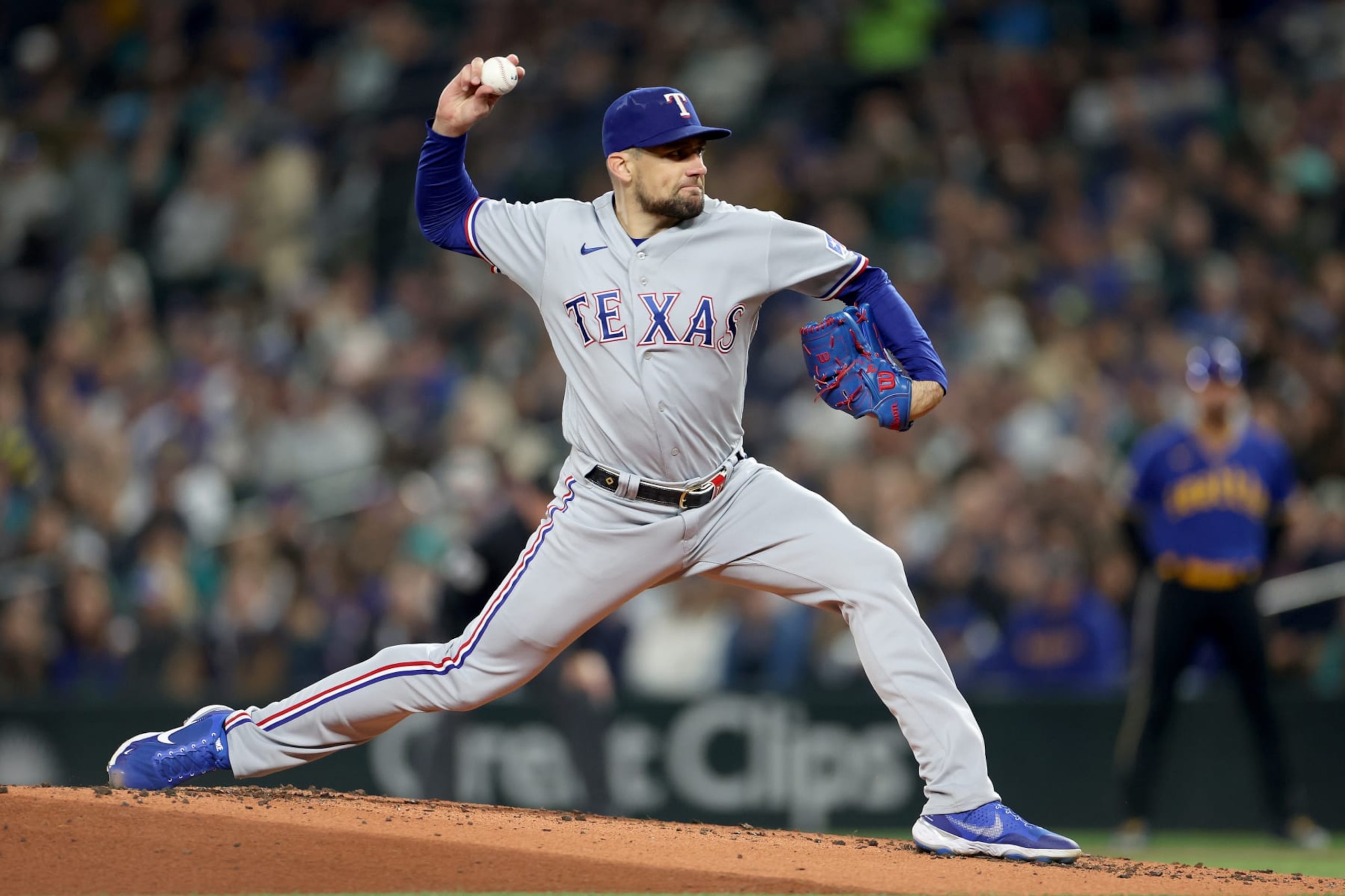 SEATTLE, WASHINGTON - SEPTEMBER 29: Nathan Eovaldi #17 of the Texas Rangers pitches during the first inning against the Seattle Mariners at T-Mobile Park on September 29, 2023 in Seattle, Washington. (Photo by Steph Chambers/Getty Images)