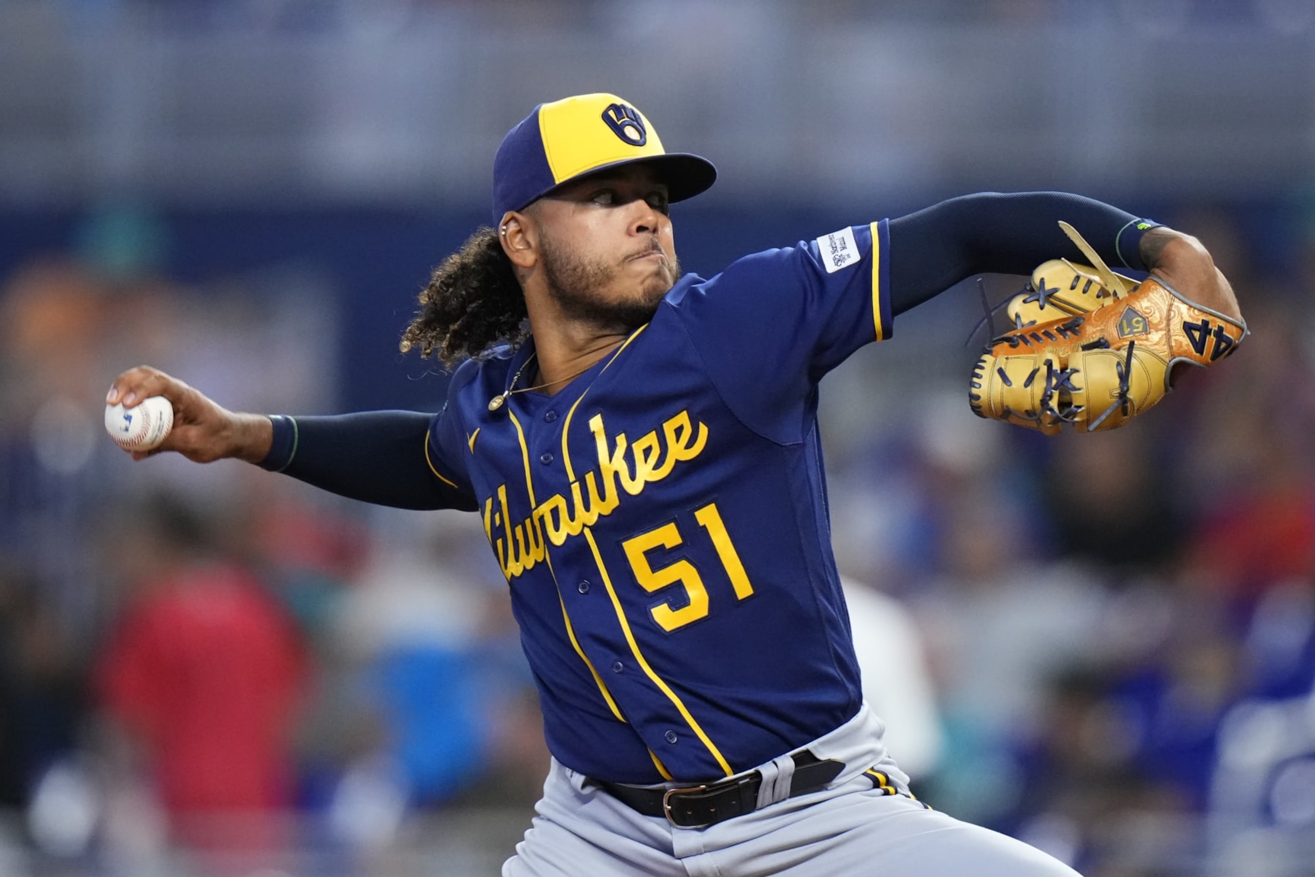 MIAMI, FLORIDA - SEPTEMBER 24: Freddy Peralta #51 of the Milwaukee Brewers throws a pitch against the Miami Marlins during the first inning at loanDepot park on September 24, 2023 in Miami, Florida. (Photo by Rich Storry/Getty Images)