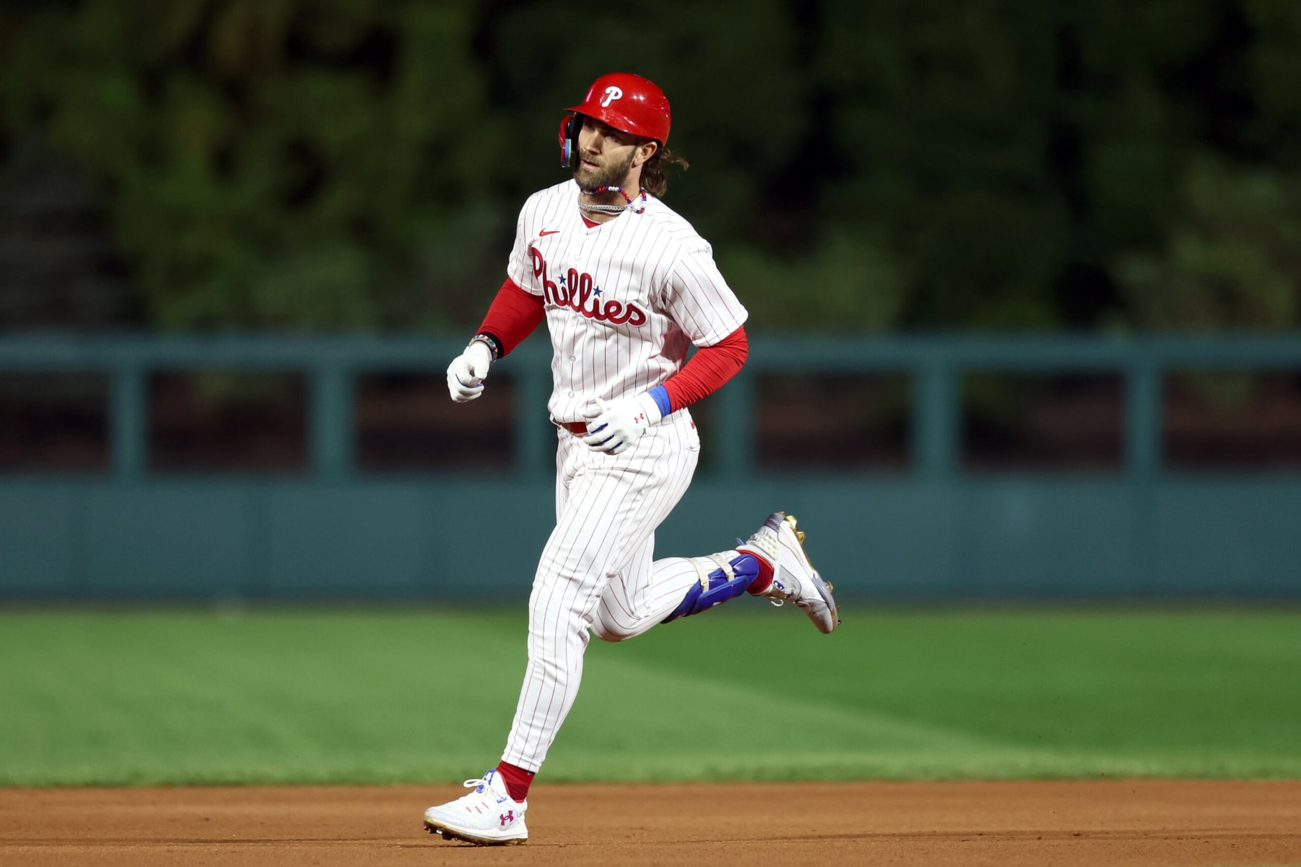 PHILADELPHIA, PENNSYLVANIA - SEPTEMBER 27: Bryce Harper #3 of the Philadelphia Phillies rounds bases after hitting a solo home run during the seventh inning against the Pittsburgh Pirates at Citizens Bank Park on September 27, 2023 in Philadelphia, Pennsylvania. (Photo by Tim Nwachukwu/Getty Images)