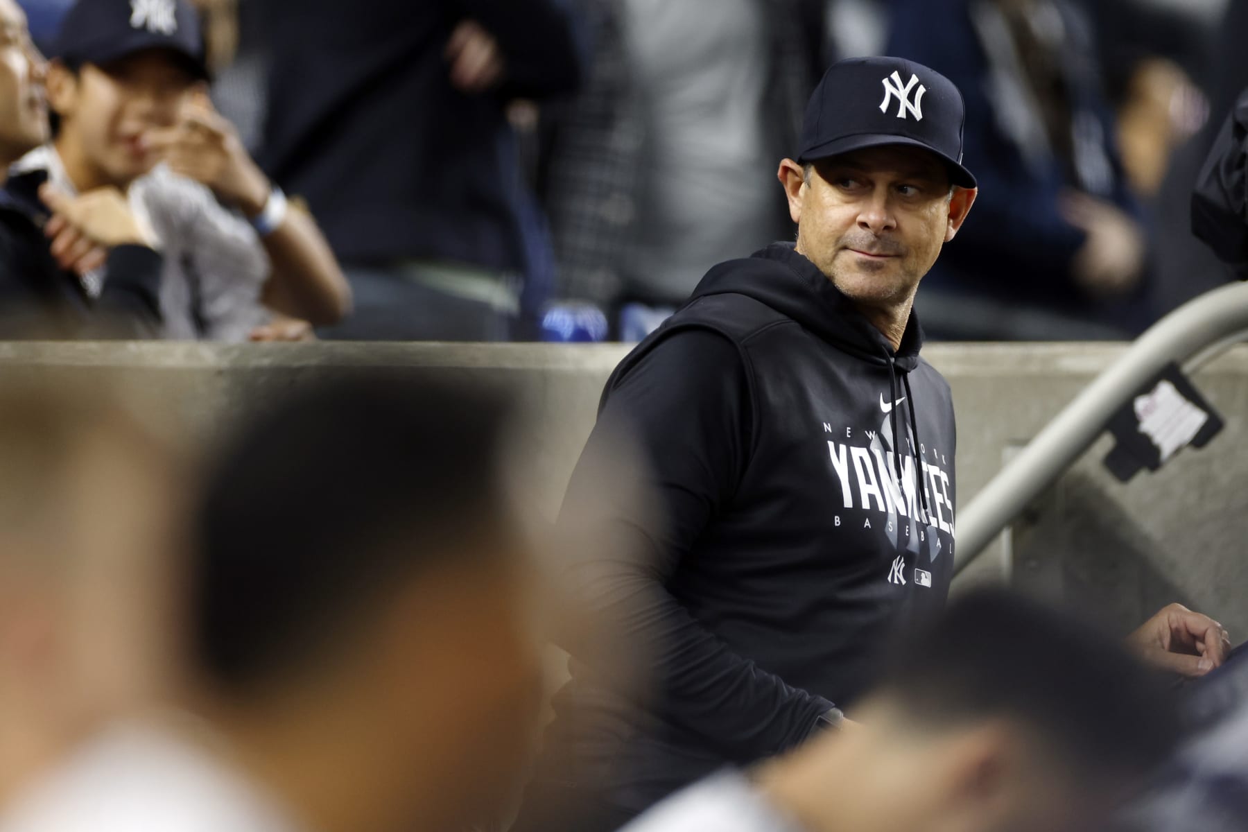 NEW YORK, NEW YORK - SEPTEMBER 22: Manager Aaron Boone #17 of the New York Yankees looks on in the dugout during the seventh inning of the game against the Arizona Diamondbacks at Yankee Stadium on September 22, 2023 in the Bronx borough of New York City. (Photo by Sarah Stier/Getty Images)