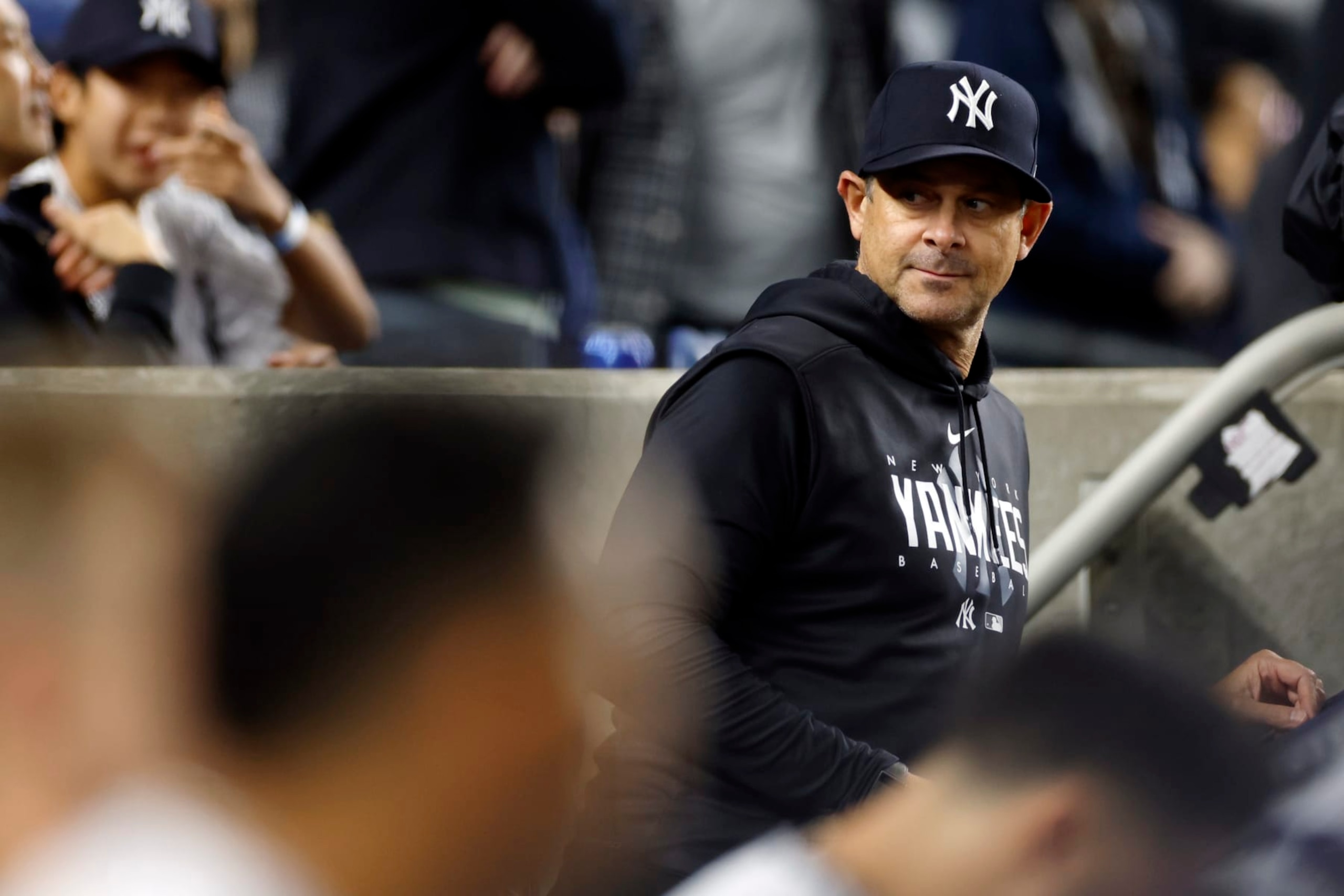 NEW YORK, NEW YORK - SEPTEMBER 22: Manager Aaron Boone #17 of the New York Yankees looks on in the dugout during the seventh inning of the game against the Arizona Diamondbacks at Yankee Stadium on September 22, 2023 in the Bronx borough of New York City. (Photo by Sarah Stier/Getty Images)