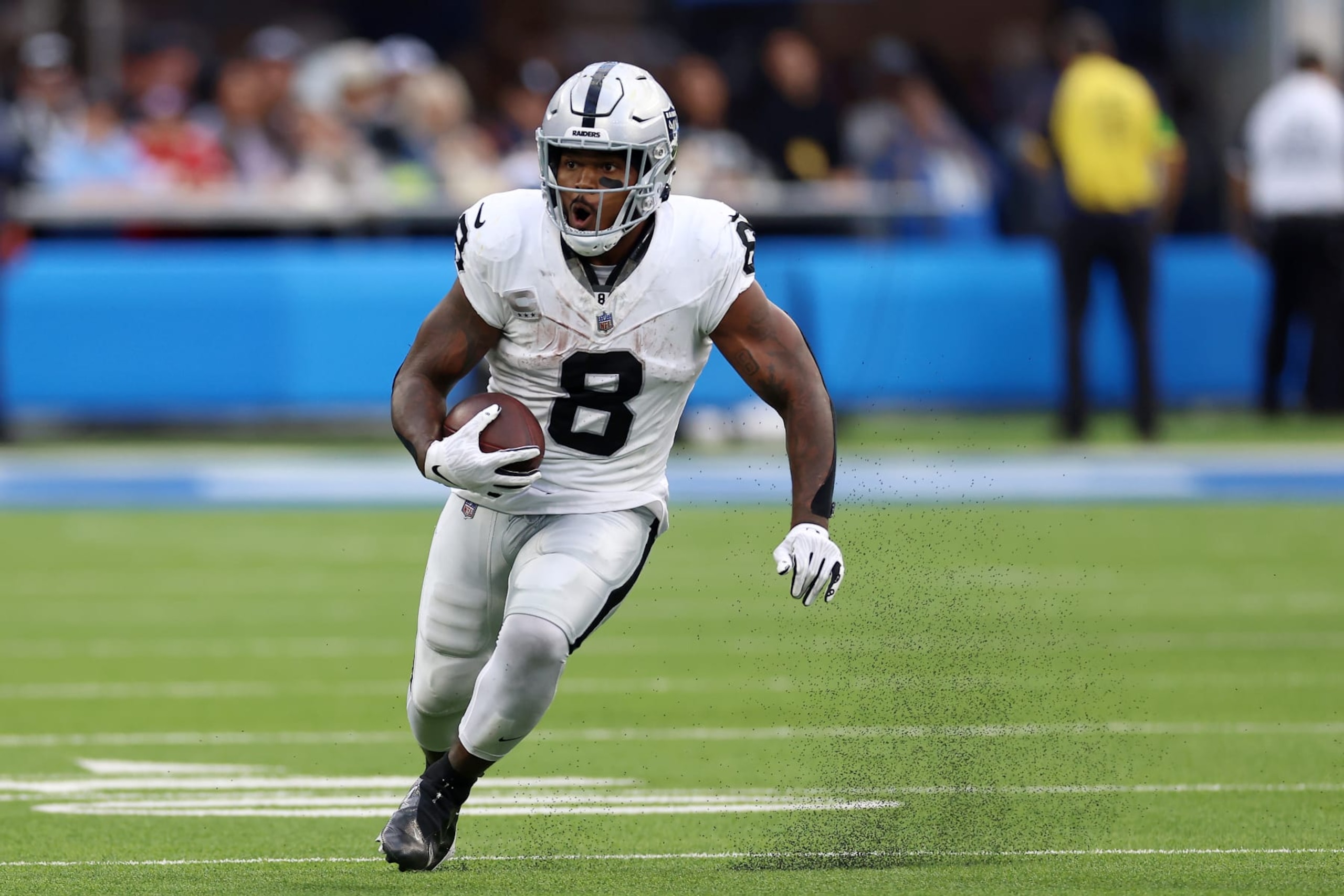 INGLEWOOD, CALIFORNIA - OCTOBER 01: Josh Jacobs #8 of the Las Vegas Raiders runs the ball during the third quarter against the Los Angeles Chargers at SoFi Stadium on October 01, 2023 in Inglewood, California. (Photo by Katelyn Mulcahy/Getty Images)