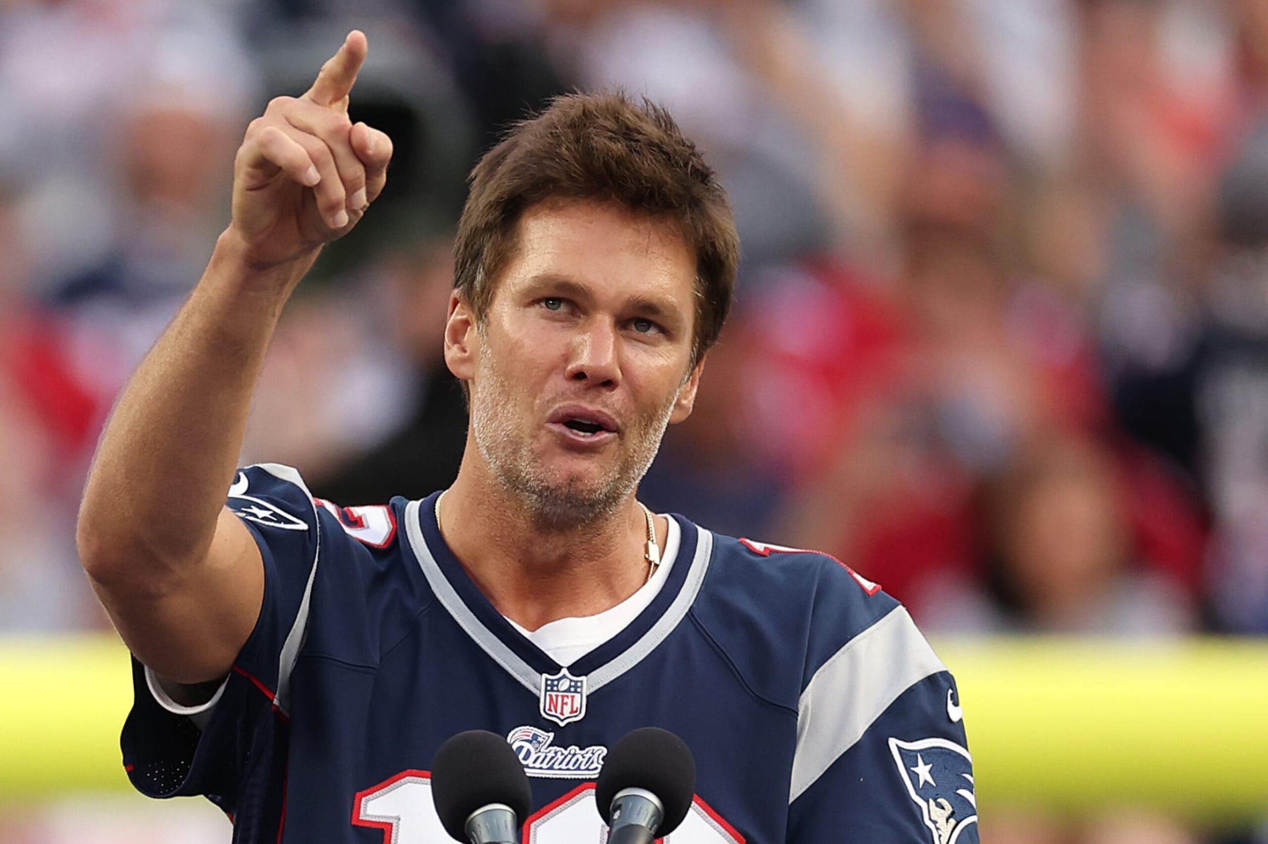 FOXBOROUGH, MASSACHUSETTS - SEPTEMBER 10: Former New England Patriots quarterback Tom Brady speaks during a ceremony honoring him at halftime of New England's game against the Philadelphia Eagles at Gillette Stadium on September 10, 2023 in Foxborough, Massachusetts. (Photo by Maddie Meyer/Getty Images) FOXBOROUGH, MASSACHUSETTS - SEPTEMBER 10: Former New England Patriots quarterback Tom Brady speaks during a ceremony honoring him at halftime of New England's game against the Philadelphia Eagles at Gillette Stadium on September 10, 2023 in Foxborough, Massachusetts. (Photo by Maddie Meyer/Getty Images)
