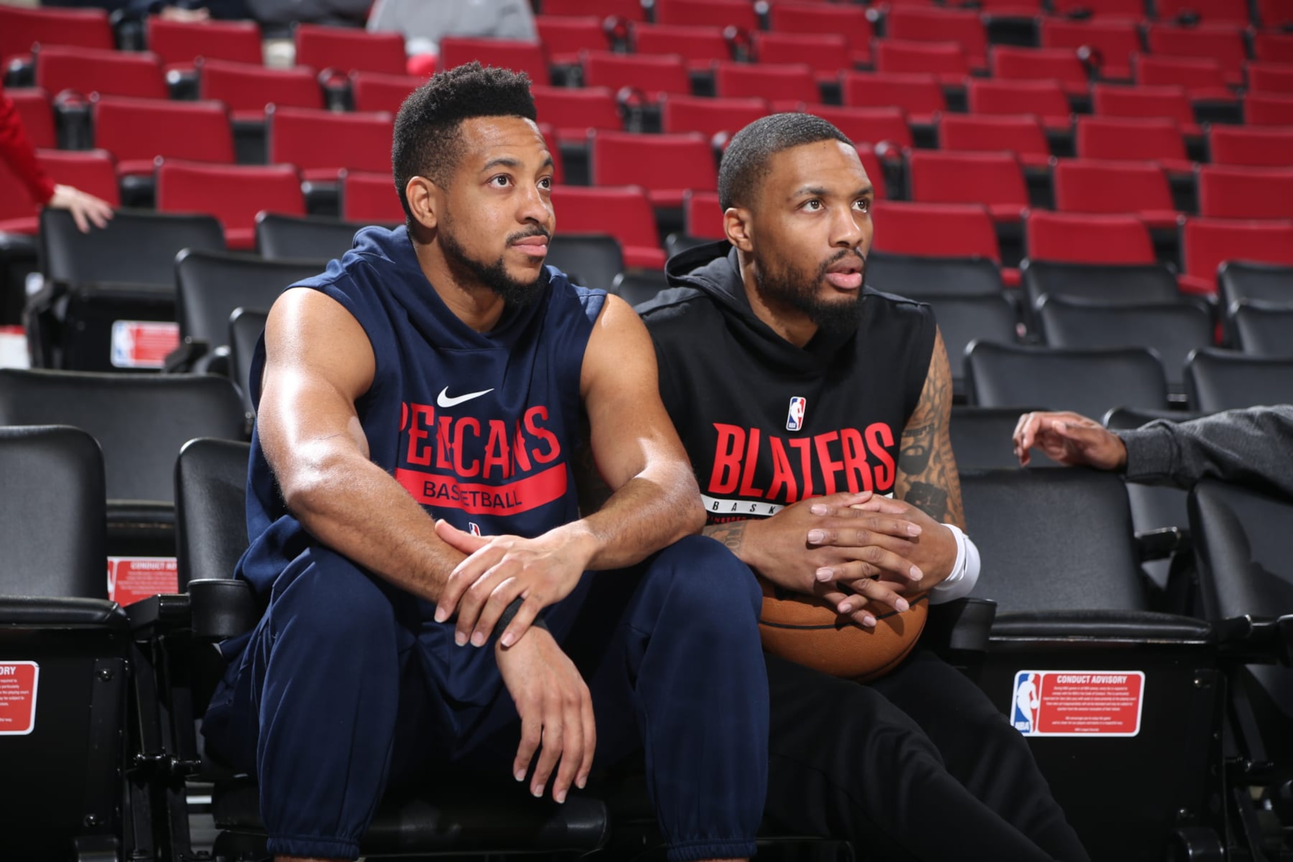 PORTLAND, OR - MARCH 27: CJ McCollum #3 of the New Orleans Pelicans talks with Damian Lillard #0 of the Portland Trail Blazers before the game on March 27, 2023 at the Moda Center Arena in Portland, Oregon. NOTE TO USER: User expressly acknowledges and agrees that, by downloading and or using this photograph, user is consenting to the terms and conditions of the Getty Images License Agreement. Mandatory Copyright Notice: Copyright 2023 NBAE (Photo by Sam Forencich/NBAE via Getty Images) PORTLAND, OR - MARCH 27: CJ McCollum #3 of the New Orleans Pelicans talks with Damian Lillard #0 of the Portland Trail Blazers before the game on March 27, 2023 at the Moda Center Arena in Portland, Oregon. NOTE TO USER: User expressly acknowledges and agrees that, by downloading and or using this photograph, user is consenting to the terms and conditions of the Getty Images License Agreement. Mandatory Copyright Notice: Copyright 2023 NBAE (Photo by Sam Forencich/NBAE via Getty Images)