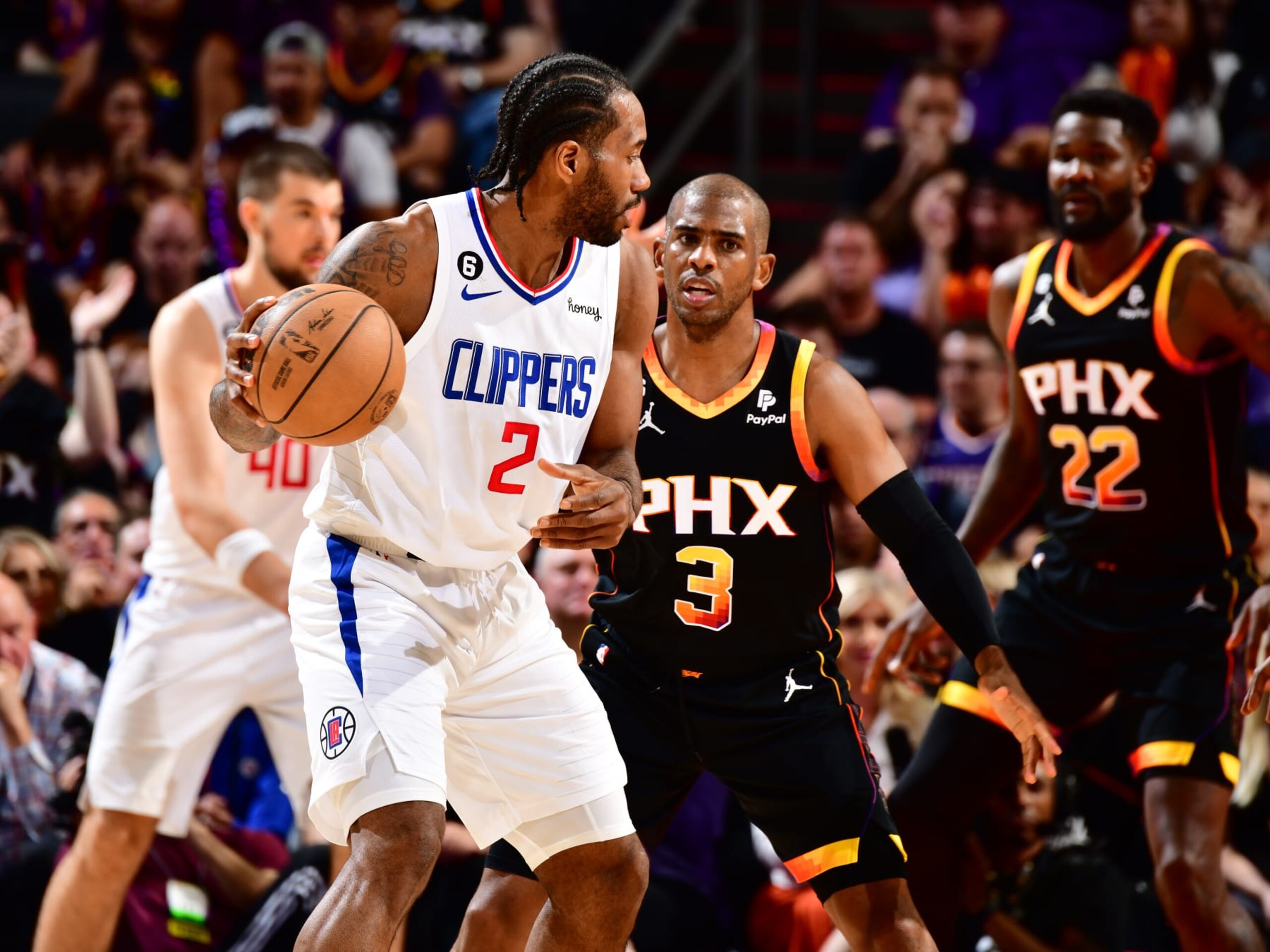 PHOENIX, AZ - APRIL 18: Chris Paul #3 of the Phoenix Suns plays defense during the game against Chris Paul #3 of the Phoenix Suns during Round 1 Game 2 of the 2023 NBA Playoffs on April 18, 2023 at Footprint Center in Phoenix, Arizona. NOTE TO USER: User expressly acknowledges and agrees that, by downloading and or using this photograph, user is consenting to the terms and conditions of the Getty Images License Agreement. Mandatory Copyright Notice: Copyright 2023 NBAE (Photo by Barry Gossage/NBAE via Getty Images)