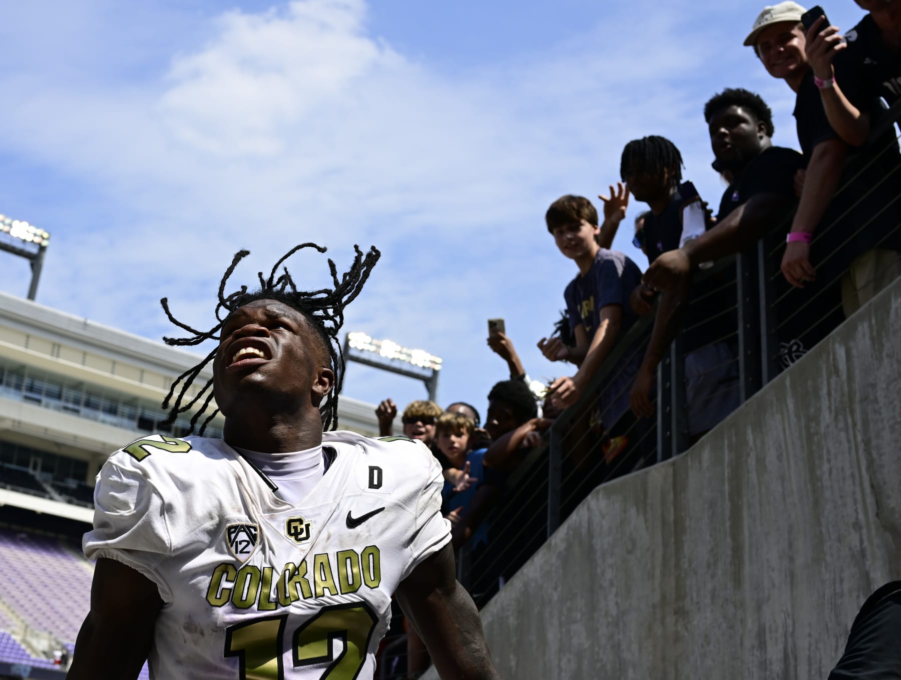 FT. WORTH, TX - SEPTEMBER 02: Colorado Buffaloes cornerback Travis Hunter (12) acknowledges fans while entering the tunnel after defeating the TCU Horned Frogs 45-42 at Amon G. Carter Stadium in Ft. Worth September 02, 2023. (Photo by Andy Cross/MediaNews Group/The Denver Post via Getty Images)