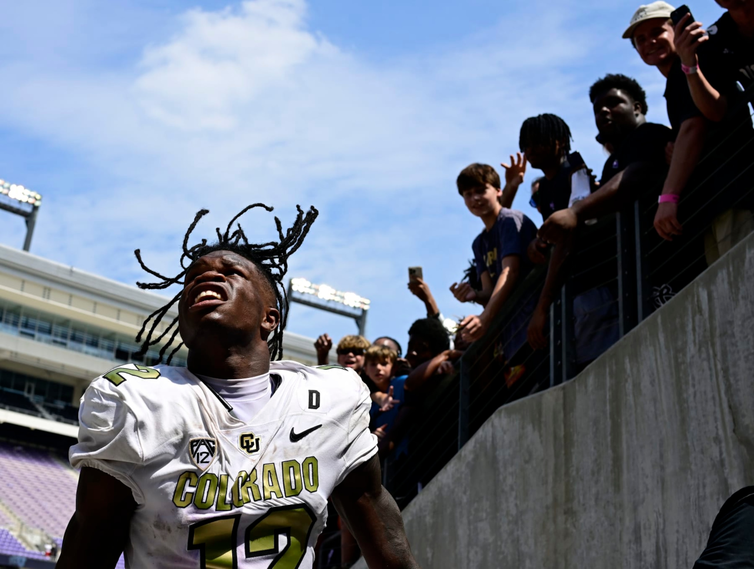 FT. WORTH, TX - SEPTEMBER 02: Colorado Buffaloes cornerback Travis Hunter (12) acknowledges fans while entering the tunnel after defeating the TCU Horned Frogs 45-42 at Amon G. Carter Stadium in Ft. Worth September 02, 2023. (Photo by Andy Cross/MediaNews Group/The Denver Post via Getty Images)