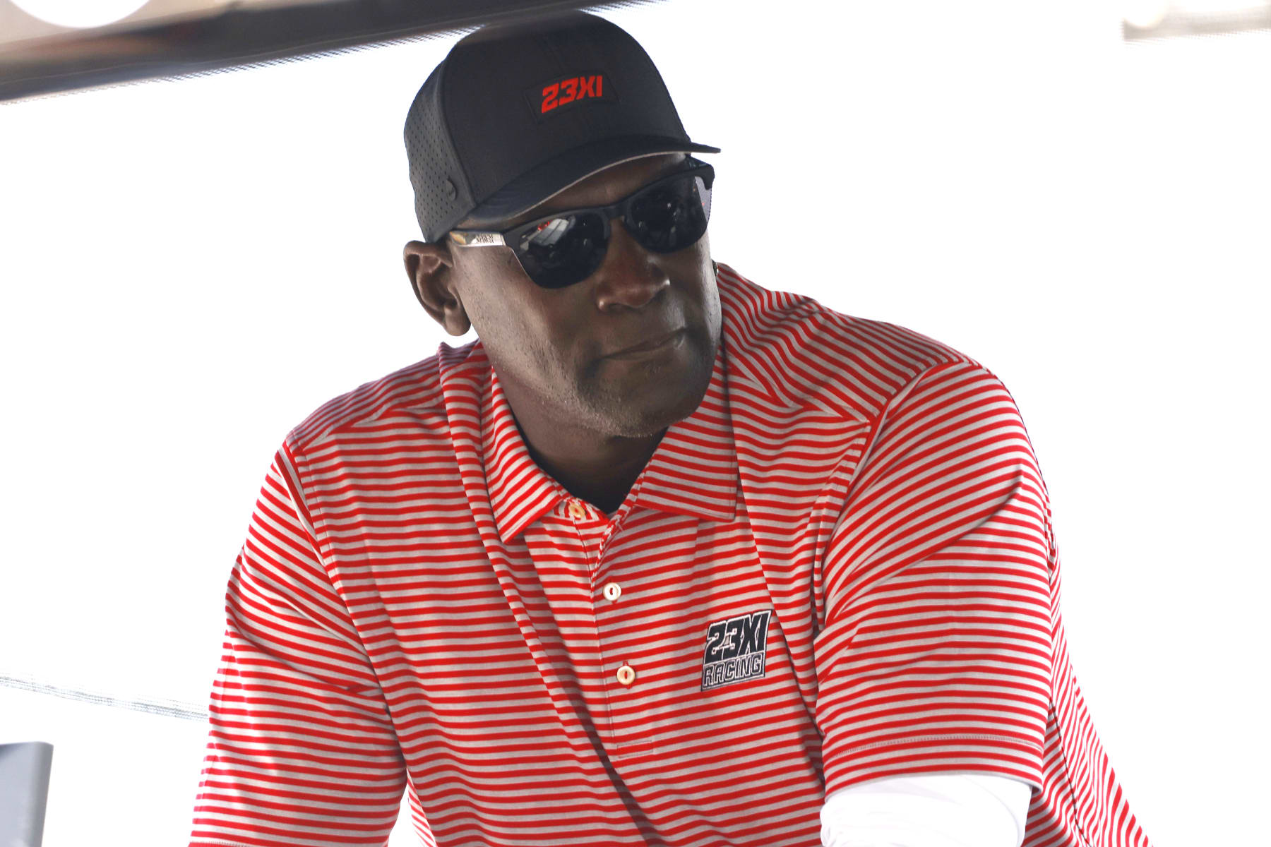 TALLADEGA, AL - OCTOBER 01: 23Xi co-owner Michael Jordan sits on the pit box and watches the action prior to  the running of the NASCAR Cup Series Playoff YellaWood 500 on October 01, 2023 at Talladega SuperSpeedway in Talladega, AL. (Photo by Jeff Robinson/Icon Sportswire via Getty Images)