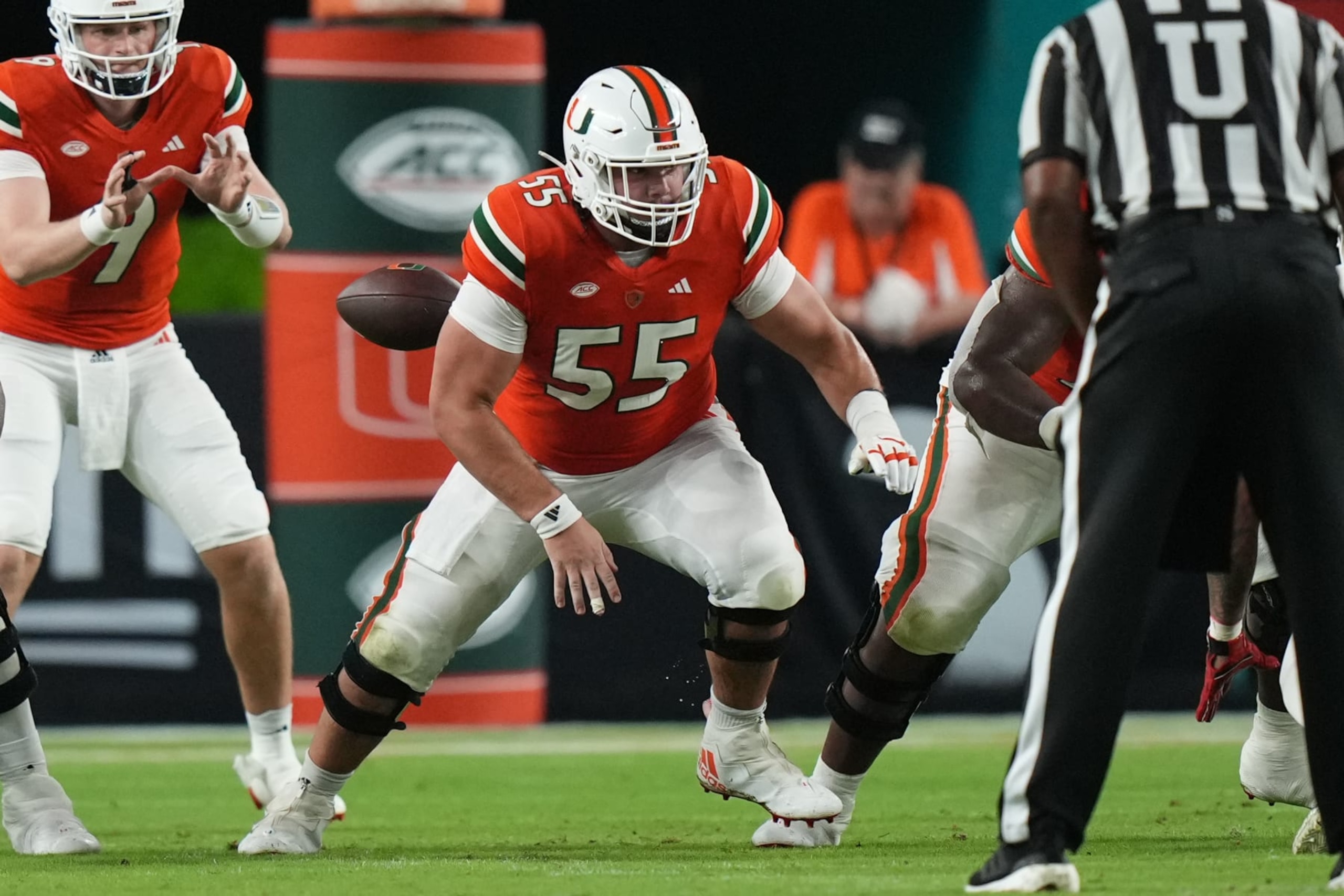 MIAMI GARDENS, FL - SEPTEMBER 01: Miami Hurricanes center Matt Lee (55) looks to make a block after the snap during the game between the Miami (Ohio) Redhawks and the Miami (FL) Hurricanes on Friday, September 1, 2023 at Hard Rock Stadium, Miami Gardens, Fla. (Photo by Peter Joneleit/Icon Sportswire via Getty Images)