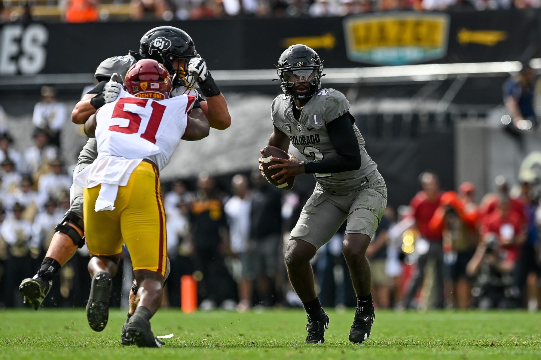 BOULDER, CO - SEPTEMBER 30:  Quarterback Shedeur Sanders #2 of the Colorado Buffaloes looks for a receiver in the second quarter against the USC Trojans at Folsom Field on September 30, 2023 in Boulder, Colorado. (Photo by Dustin Bradford/Getty Images)