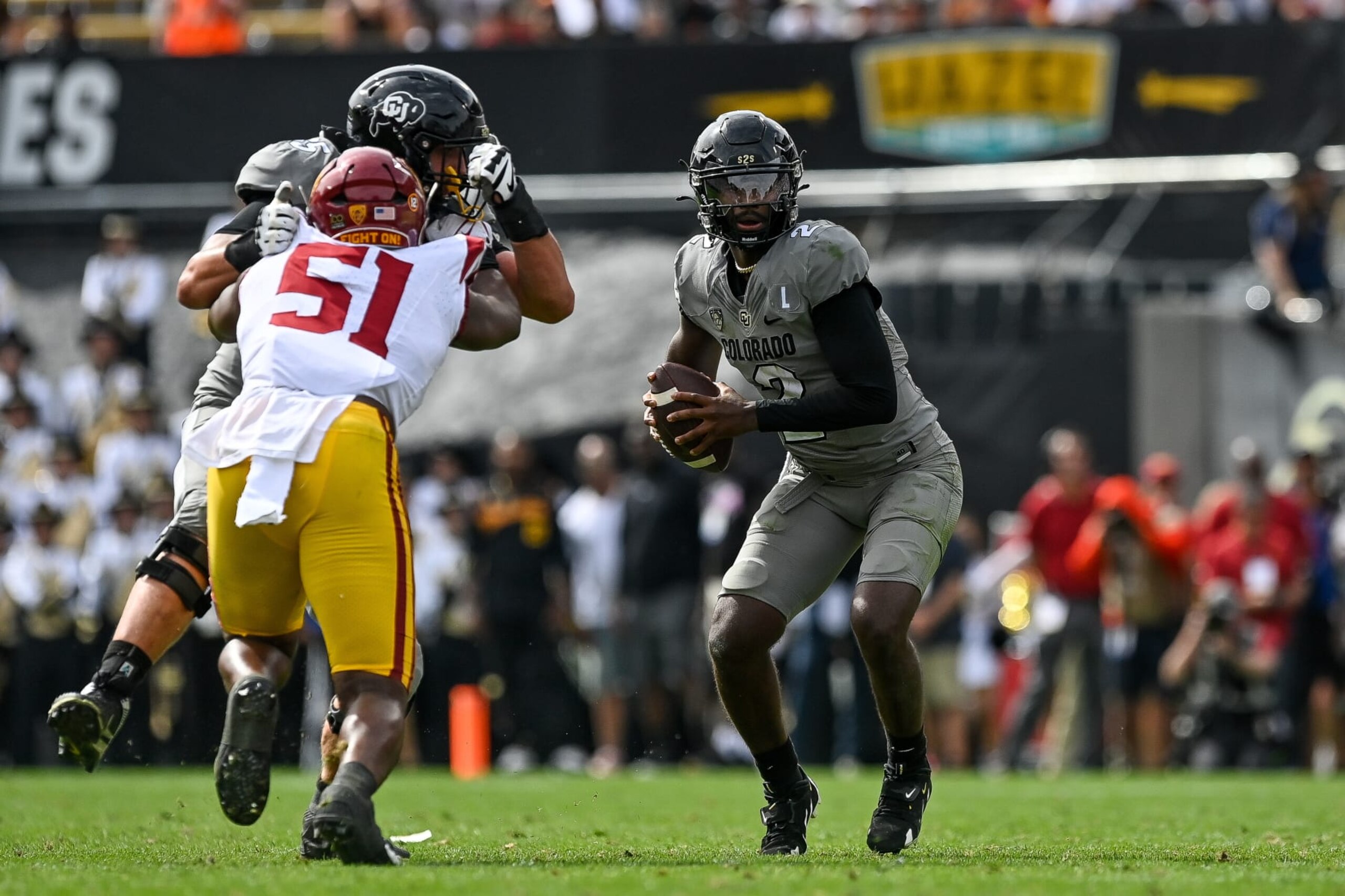 BOULDER, CO - SEPTEMBER 30:  Quarterback Shedeur Sanders #2 of the Colorado Buffaloes looks for a receiver in the second quarter against the USC Trojans at Folsom Field on September 30, 2023 in Boulder, Colorado. (Photo by Dustin Bradford/Getty Images)