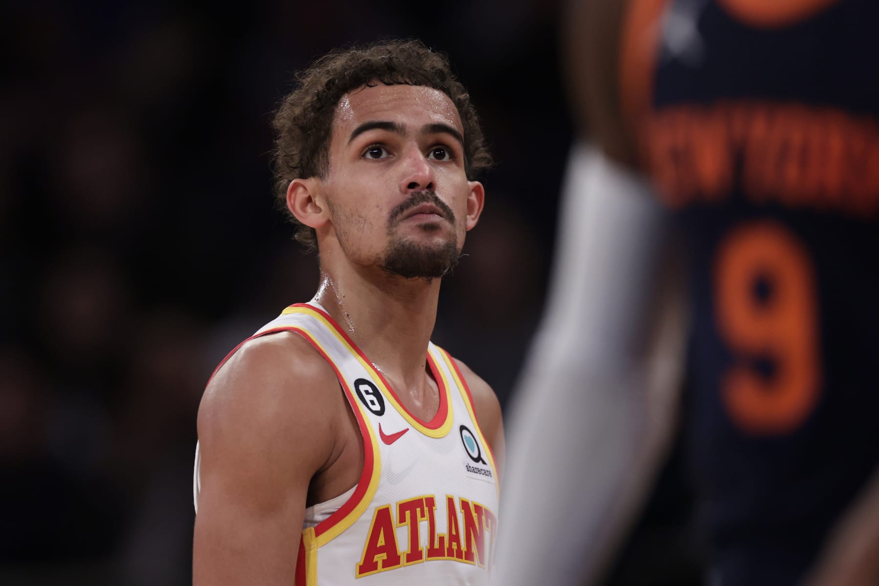 NEW YORK, NEW YORK - DECEMBER 7: Trae Young #11 of the Atlanta Hawks reacts against the New York Knicks during the second half at Madison Square Garden on December 7, 2022 in New York City. NOTE TO USER: User expressly acknowledges and agrees that, by downloading and or using this Photograph, user is consenting to the terms and conditions of the Getty Images License Agreement.  (Photo by Adam Hunger/Getty Images)
