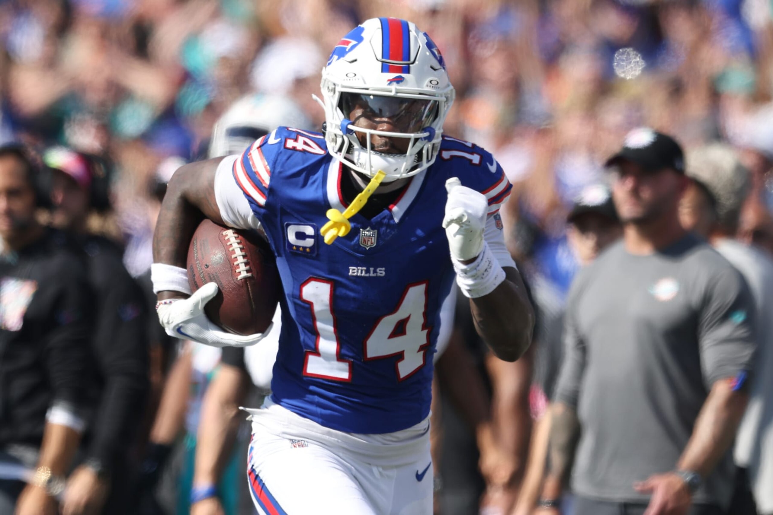 ORCHARD PARK, NEW YORK - OCTOBER 01: Stefon Diggs #14 of the Buffalo Bills runs with a reception for a touchdown during the second quarter against the Miami Dolphins at Highmark Stadium on October 01, 2023 in Orchard Park, New York. (Photo by Bryan M. Bennett/Getty Images) ORCHARD PARK, NEW YORK - OCTOBER 01: Stefon Diggs #14 of the Buffalo Bills runs with a reception for a touchdown during the second quarter against the Miami Dolphins at Highmark Stadium on October 01, 2023 in Orchard Park, New York. (Photo by Bryan M. Bennett/Getty Images)