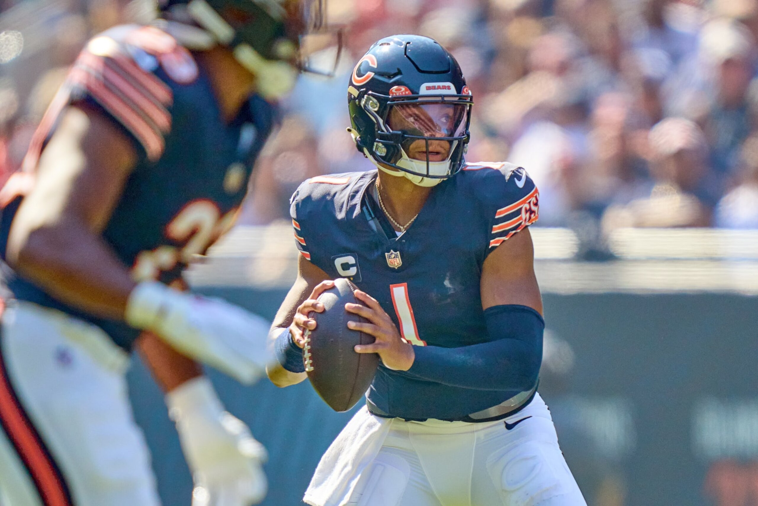 CHICAGO, IL - OCTOBER 01: Chicago Bears quarterback Justin Fields (1) looks to throw the football in action during a game between the Chicago Bears and the Denver Broncos on October 01, 2023 at Soldier Field in Chicago, IL. (Photo by Robin Alam/Icon Sportswire via Getty Images) CHICAGO, IL - OCTOBER 01: Chicago Bears quarterback Justin Fields (1) looks to throw the football in action during a game between the Chicago Bears and the Denver Broncos on October 01, 2023 at Soldier Field in Chicago, IL. (Photo by Robin Alam/Icon Sportswire via Getty Images)