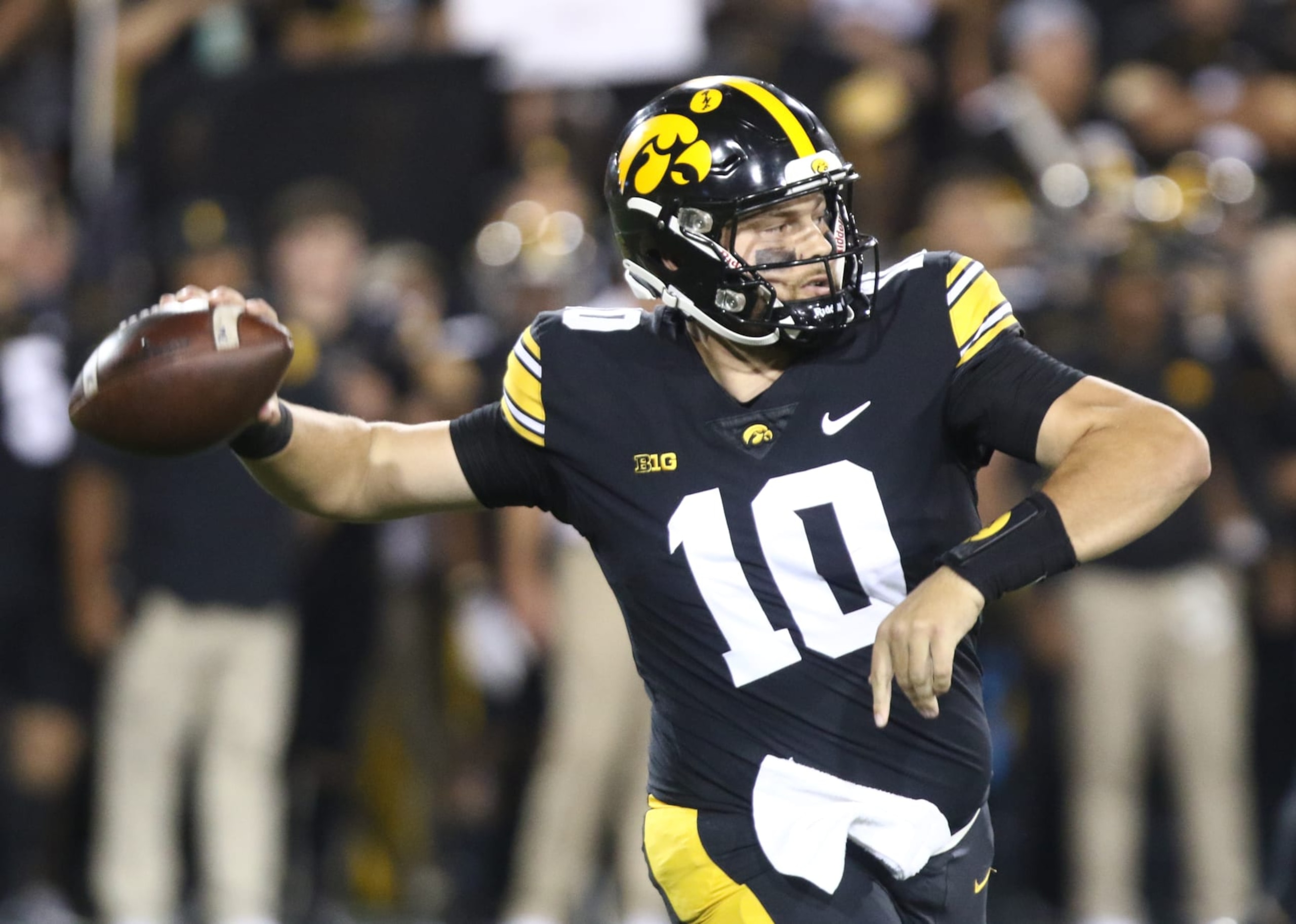 IOWA CITY, IOWA- SEPTEMBER 30: Quarterback Deacon Hill #10 of the Iowa Hawkeyes throws a pass during the first half against the Michigan State Spartans at Kinnick Stadium on September 30, 2023 in Iowa City, Iowa. (Photo by Matthew Holst/Getty Images) IOWA CITY, IOWA- SEPTEMBER 30: Quarterback Deacon Hill #10 of the Iowa Hawkeyes throws a pass during the first half against the Michigan State Spartans at Kinnick Stadium on September 30, 2023 in Iowa City, Iowa. (Photo by Matthew Holst/Getty Images)