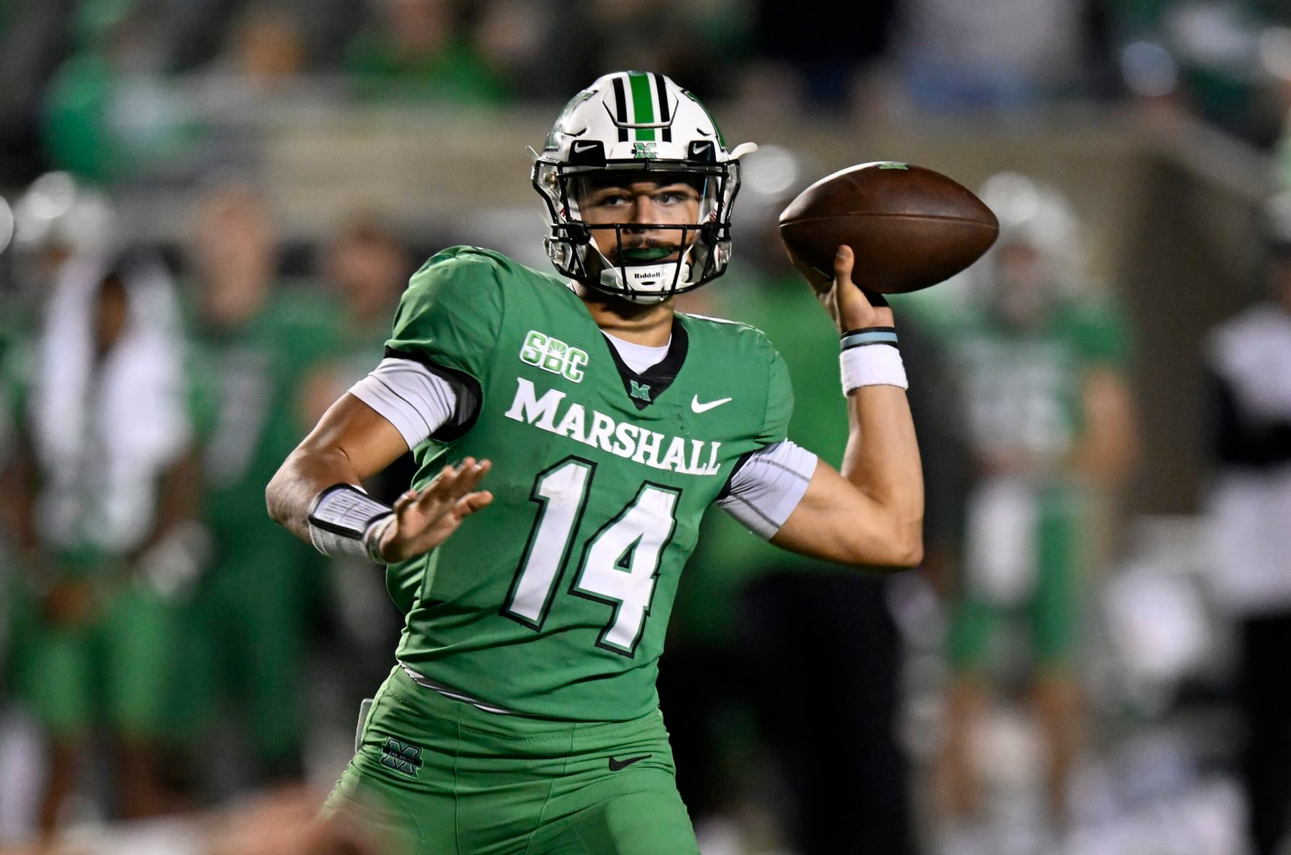 HUNTINGTON, WEST VIRGINIA - OCTOBER 29: Cam Fancher #14 of the Marshall Thundering Herd throws a pass in the fourth quarter against the Coastal Carolina Chanticleers at Joan C. Edwards Stadium on October 29, 2022 in Huntington, West Virginia. (Photo by Greg Fiume/Getty Images)