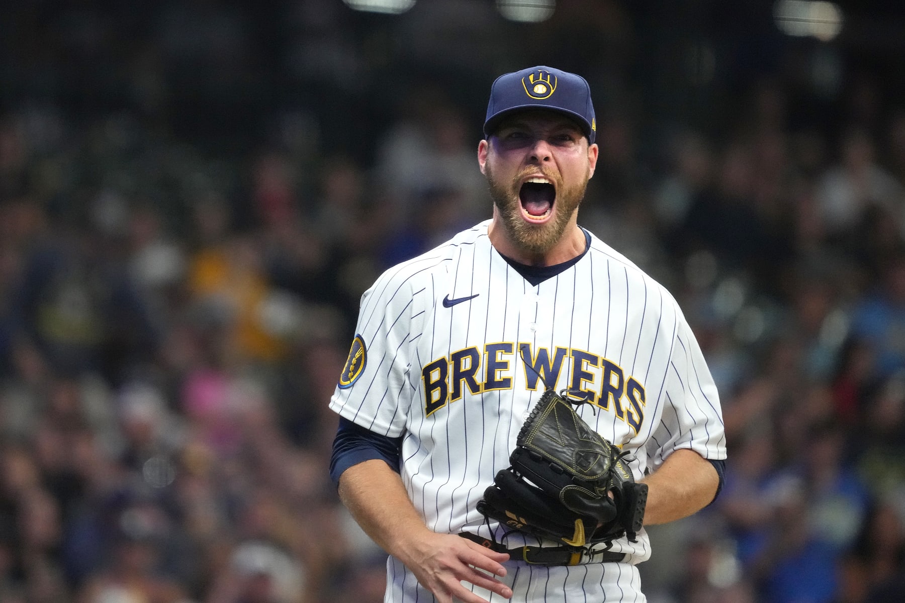 MILWAUKEE, WISCONSIN - SEPTEMBER 16: Corbin Burnes #39 of the Milwaukee Brewers reacts to striking out a batter in the first inning against the Washington Nationals at American Family Field on September 16, 2023 in Milwaukee, Wisconsin. (Photo by Kayla Wolf/Getty Images)