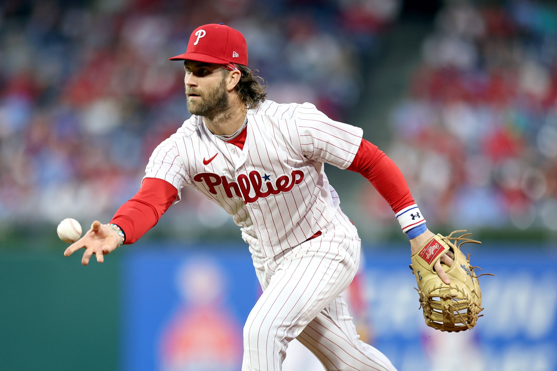 PHILADELPHIA, PENNSYLVANIA - SEPTEMBER 26: Bryce Harper #3 of the Philadelphia Phillies fields a ground ball during the first inning against the Pittsburgh Pirates at Citizens Bank Park on September 26, 2023 in Philadelphia, Pennsylvania. (Photo by Tim Nwachukwu/Getty Images)