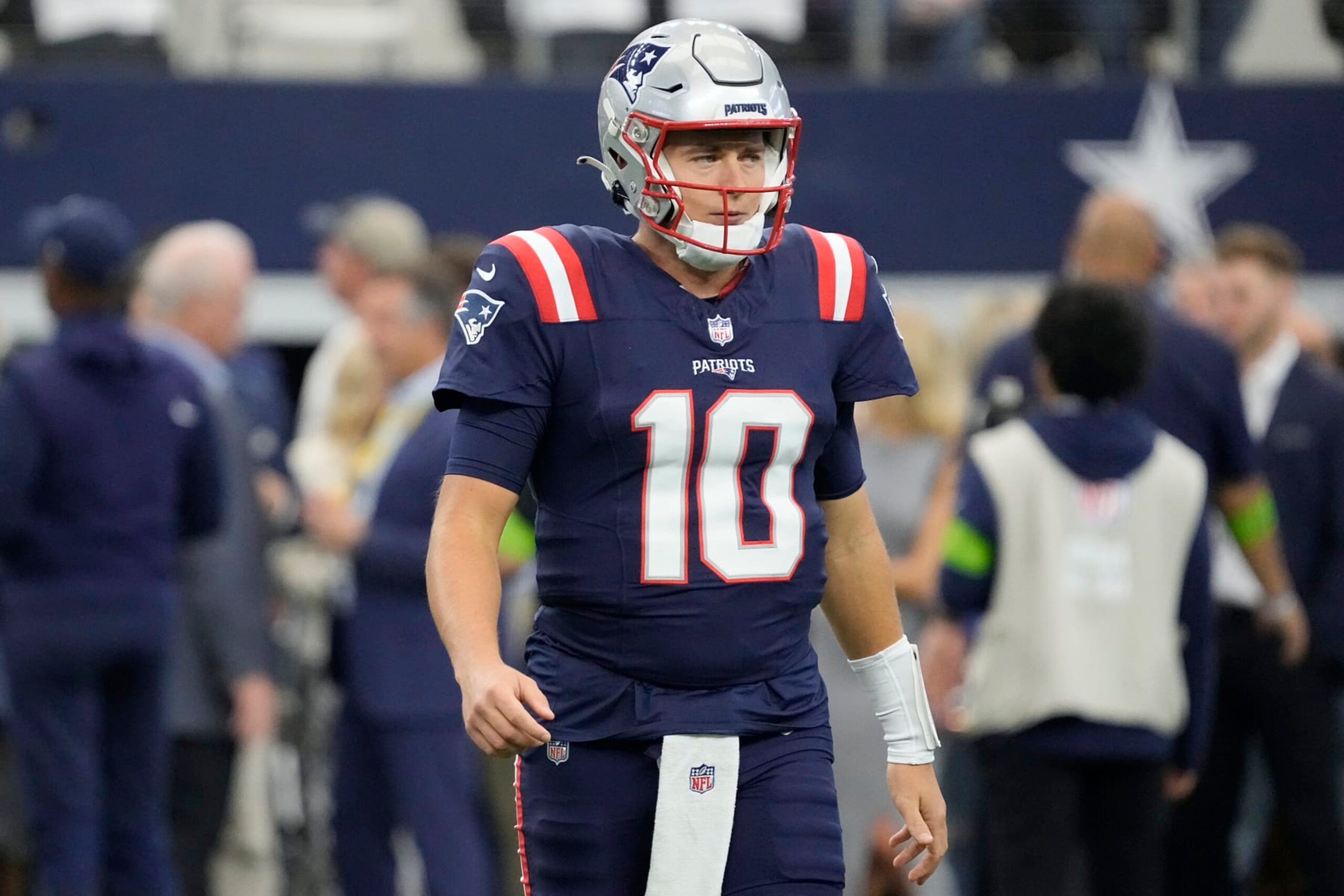 ARLINGTON, TEXAS - OCTOBER 01: Mac Jones #10 of the New England Patriots looks prior to a game against the Dallas Cowboys at AT&T Stadium on October 01, 2023 in Arlington, Texas. (Photo by Sam Hodde/Getty Images)