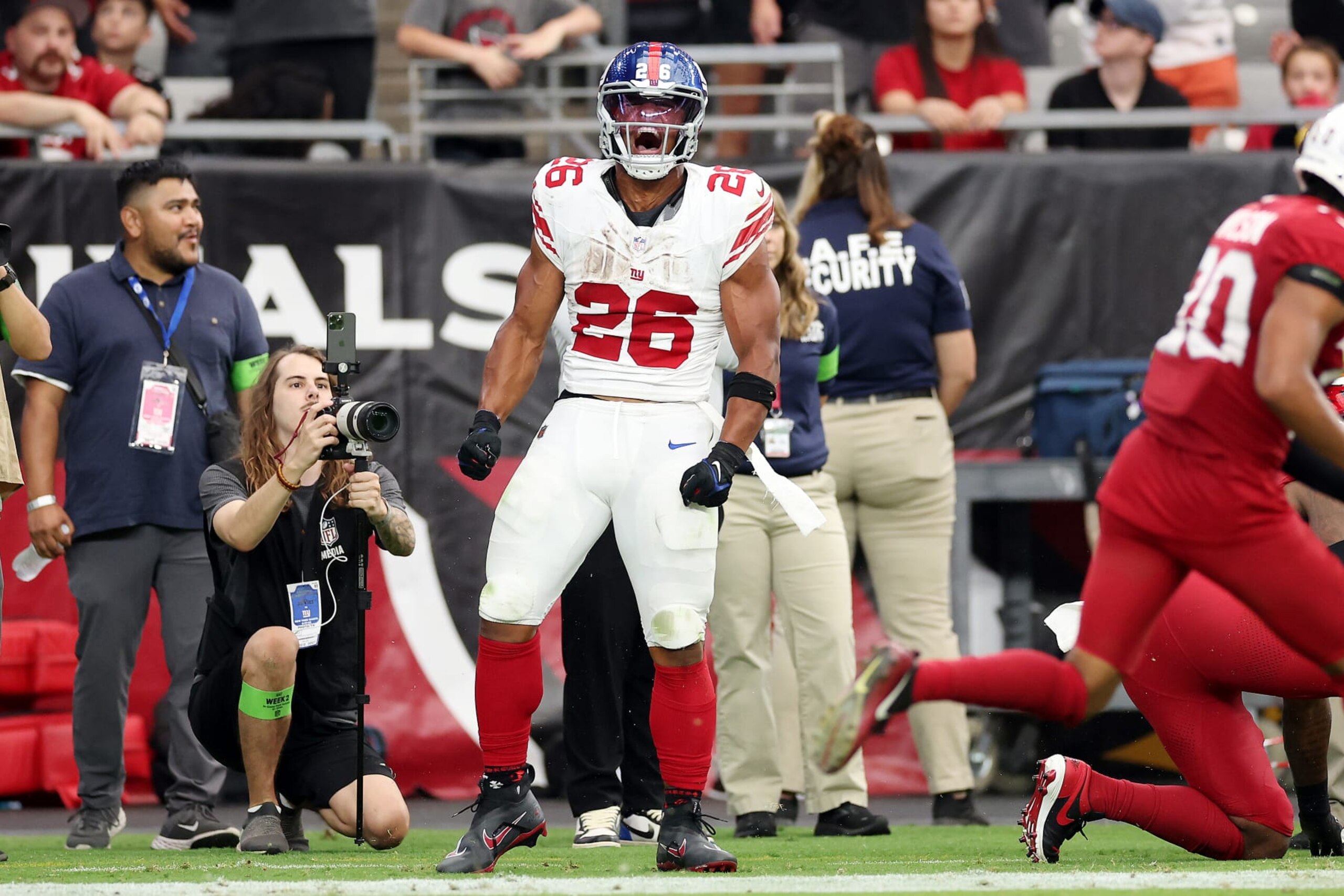 GLENDALE, ARIZONA - SEPTEMBER 17: Saquon Barkley #26 of the New York Giants celebrates a touchdown during the fourth quarter in the game against the Arizona Cardinals at State Farm Stadium on September 17, 2023 in Glendale, Arizona. (Photo by Christian Petersen/Getty Images) GLENDALE, ARIZONA - SEPTEMBER 17: Saquon Barkley #26 of the New York Giants celebrates a touchdown during the fourth quarter in the game against the Arizona Cardinals at State Farm Stadium on September 17, 2023 in Glendale, Arizona. (Photo by Christian Petersen/Getty Images)