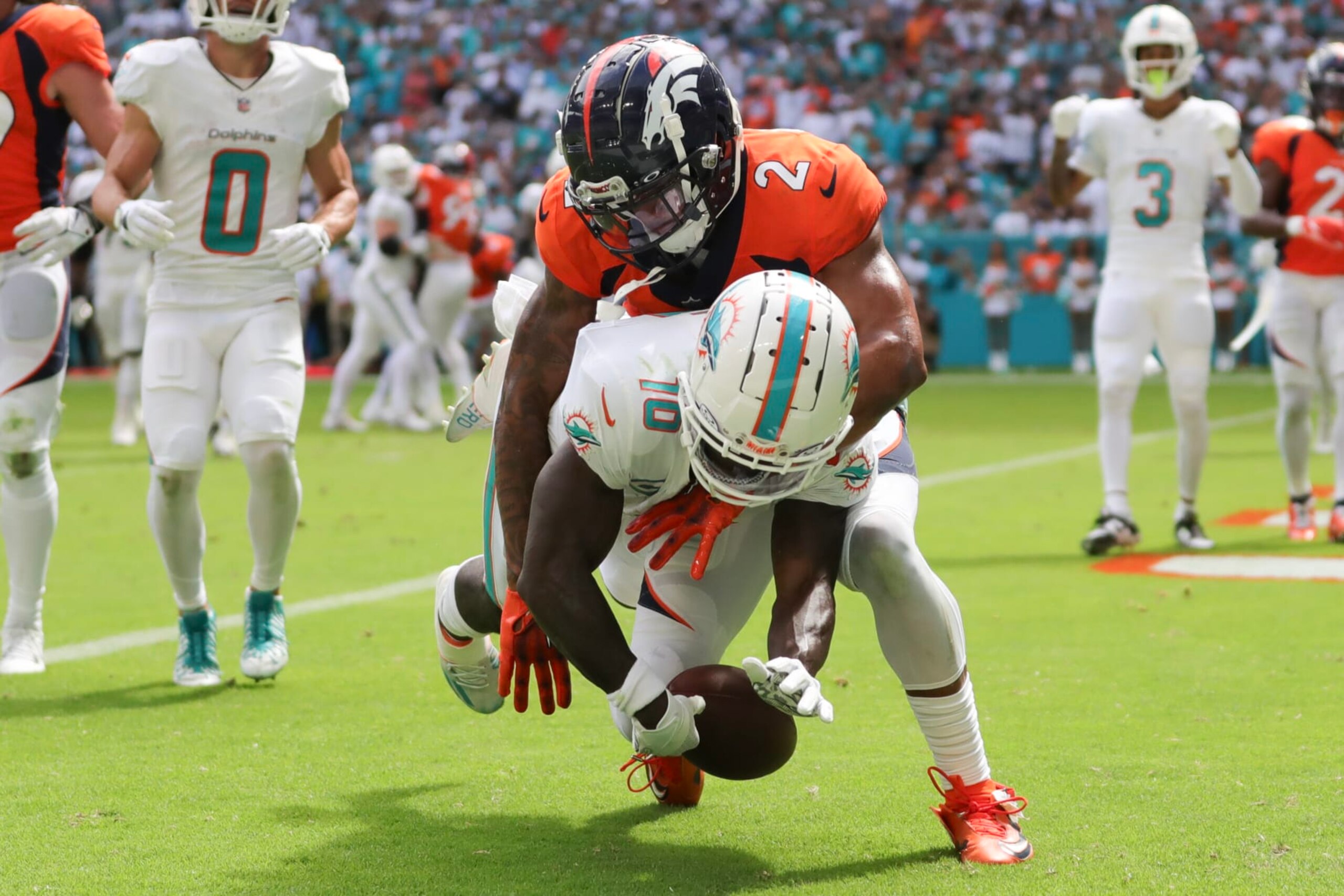 MIAMI GARDENS, FLORIDA - SEPTEMBER 24: Pat Surtain II #2 of the Denver Broncos breaks up a pass intended for Tyreek Hill #10 of the Miami Dolphins during the third quarter at Hard Rock Stadium on September 24, 2023 in Miami Gardens, Florida. (Photo by Megan Briggs/Getty Images) MIAMI GARDENS, FLORIDA - SEPTEMBER 24: Pat Surtain II #2 of the Denver Broncos breaks up a pass intended for Tyreek Hill #10 of the Miami Dolphins during the third quarter at Hard Rock Stadium on September 24, 2023 in Miami Gardens, Florida. (Photo by Megan Briggs/Getty Images)