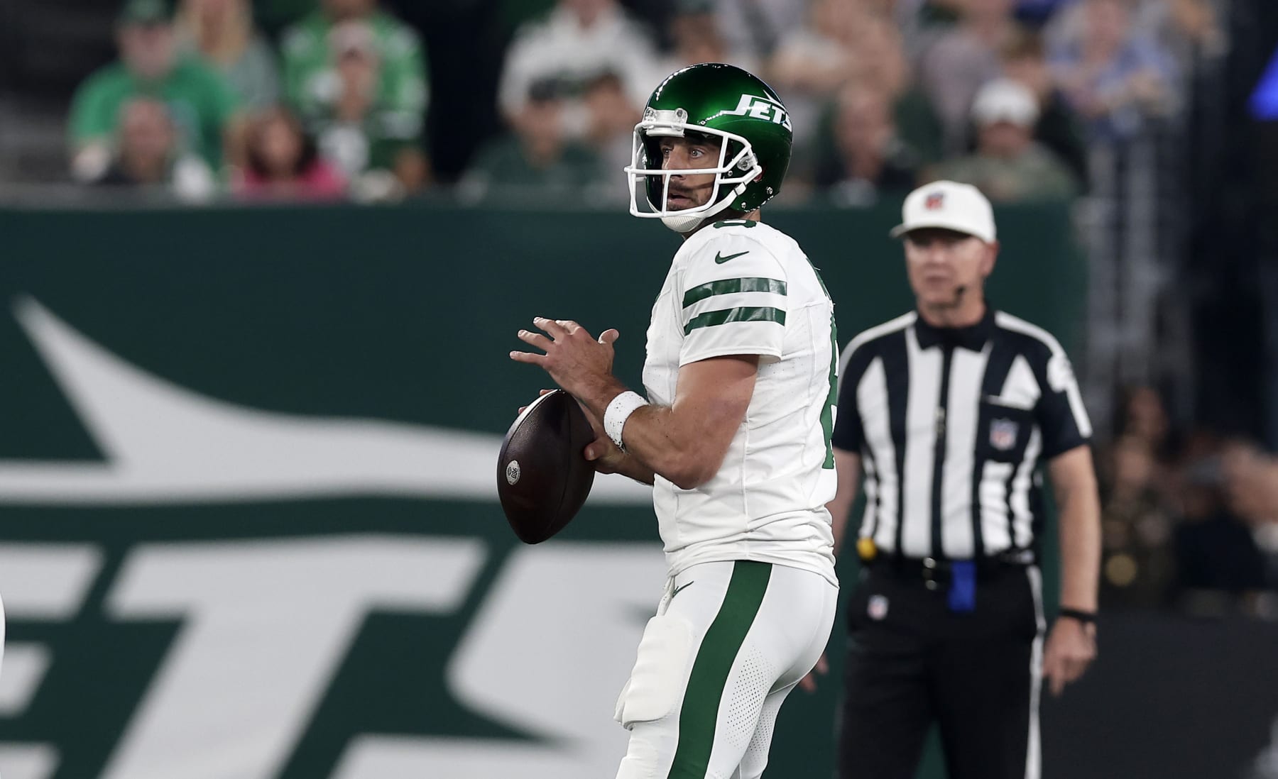 EAST RUTHERFORD, NEW JERSEY - SEPTEMBER 11: (NEW YORK DAILIES OUT)  Aaron Rodgers #8 of the New York Jets in action against the Buffalo Bills at MetLife Stadium on September 11, 2023 in East Rutherford, New Jersey. The Jets defeated the Bills 22-16 in overtime. (Photo by Jim McIsaac/Getty Images)