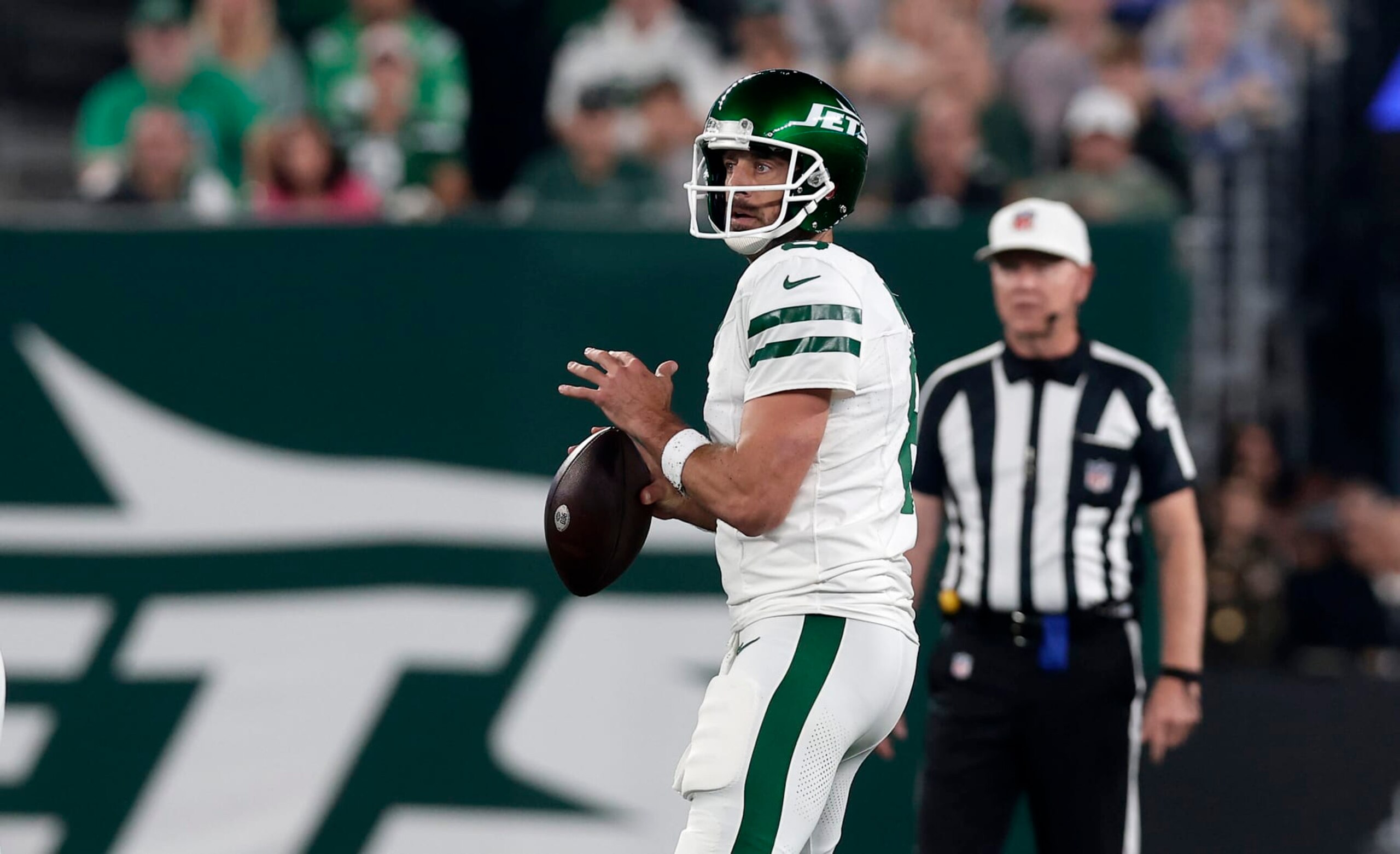 EAST RUTHERFORD, NEW JERSEY - SEPTEMBER 11: (NEW YORK DAILIES OUT)  Aaron Rodgers #8 of the New York Jets in action against the Buffalo Bills at MetLife Stadium on September 11, 2023 in East Rutherford, New Jersey. The Jets defeated the Bills 22-16 in overtime. (Photo by Jim McIsaac/Getty Images)