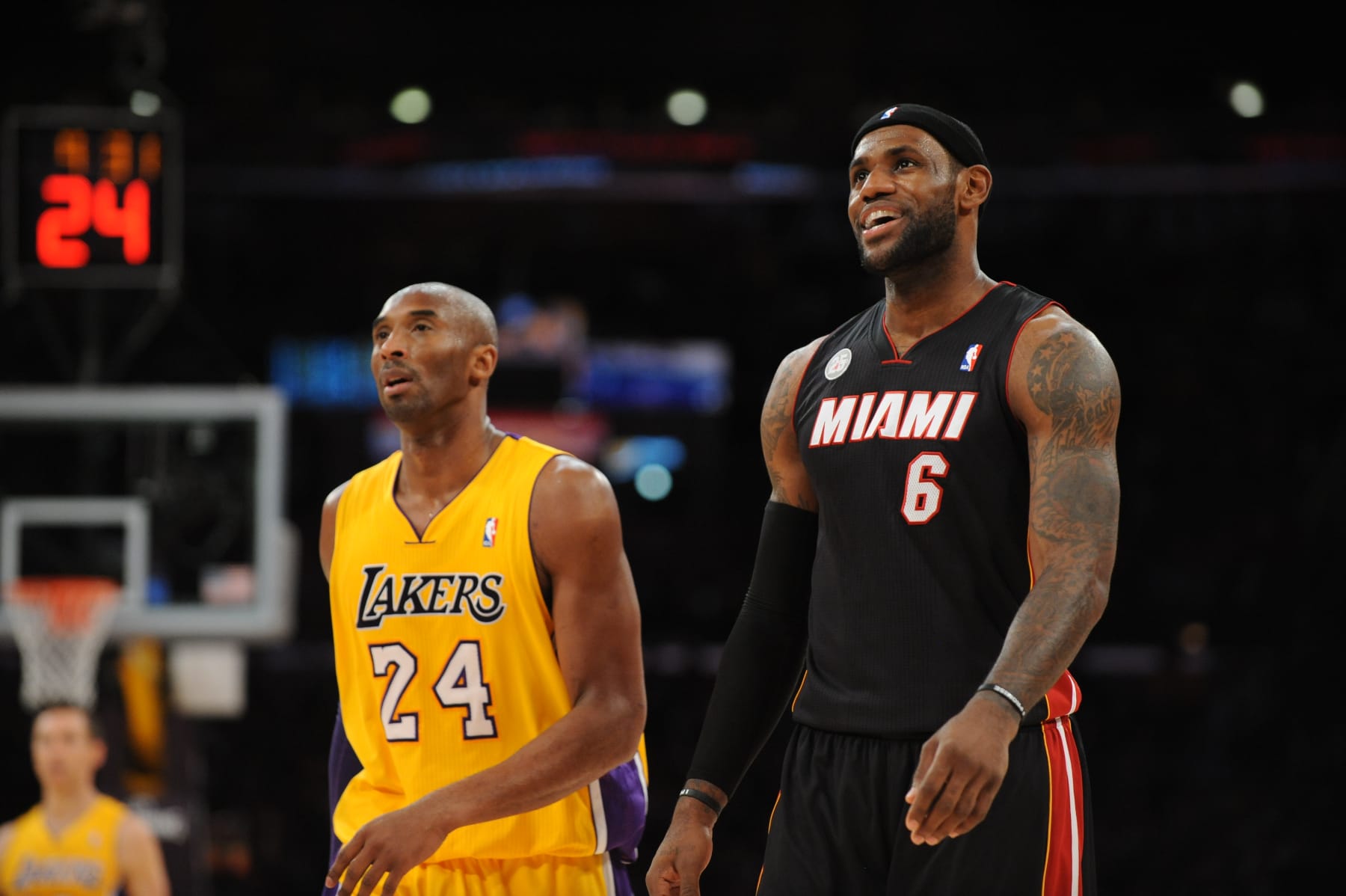 LOS ANGELES, CA - JANUARY 17: Kobe Bryant #24 of the Los Angeles Lakers and LeBron James #6 of the Miami Heat look on at Staples Center on January 15, 2013 in Los Angeles, California. NOTE TO USER: User expressly acknowledges and agrees that, by downloading and/or using this Photograph, user is consenting to the terms and conditions of the Getty Images License Agreement. Mandatory Copyright Notice: Copyright 2013 NBAE (Photo by Noah Graham/NBAE via Getty Images)