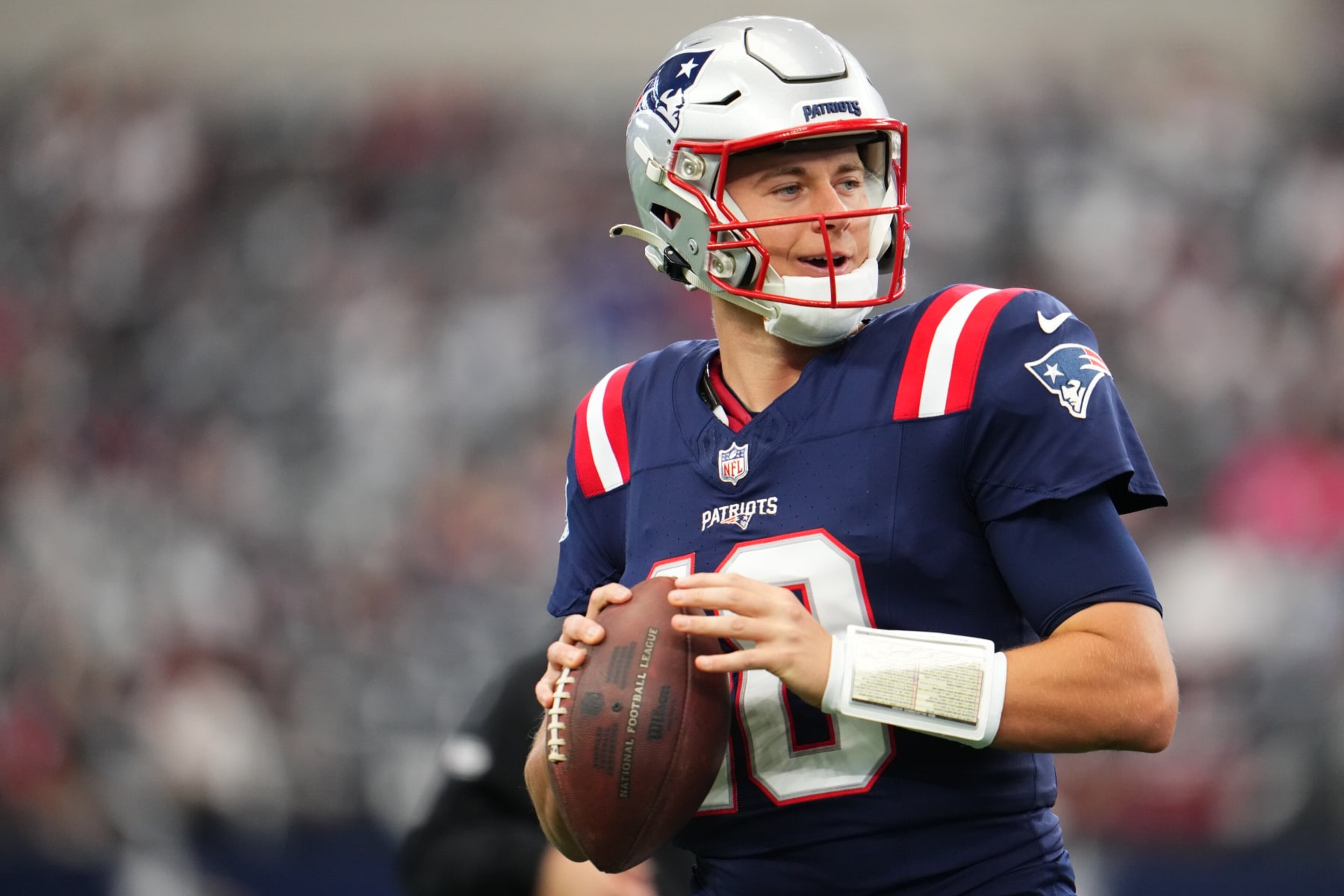 ARLINGTON, TX - OCTOBER 01: Mac Jones #10 of the New England Patriots warms up before kickoff against the Dallas Cowboys at AT&T Stadium on October 1, 2023 in Arlington, Texas. (Photo by Cooper Neill/Getty Images)