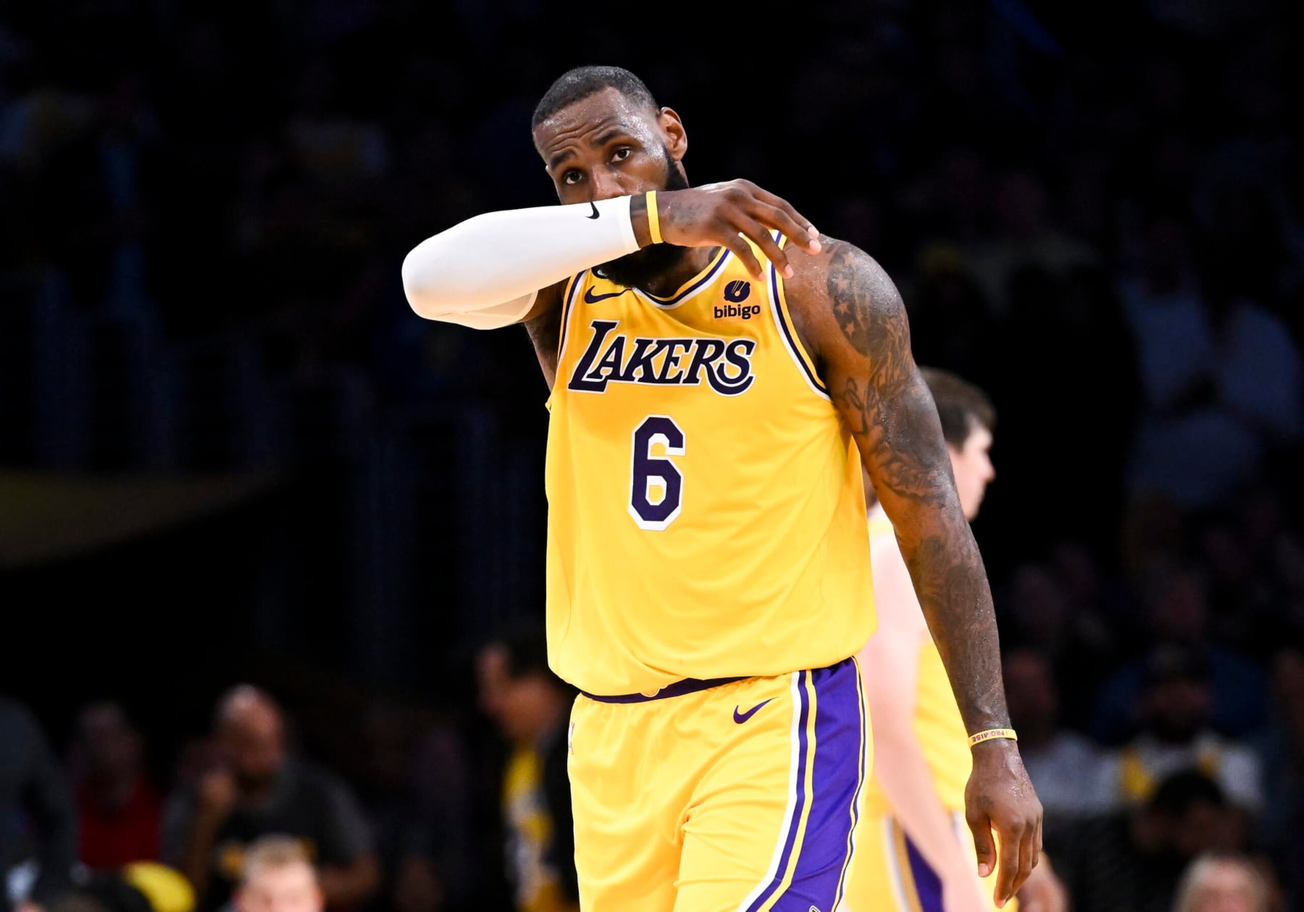 LOS ANGELES, CA - MAY 22: Los Angeles Lakers forward LeBron James wipes his face during the fourth quarter of game four in the NBA Playoffs Western Conference Finals against the Denver Nuggets at Crypto.com Arena on Monday, May 22, 2023 in Los Angeles, CA. (Wally Skalij / Los Angeles Times via Getty Images)