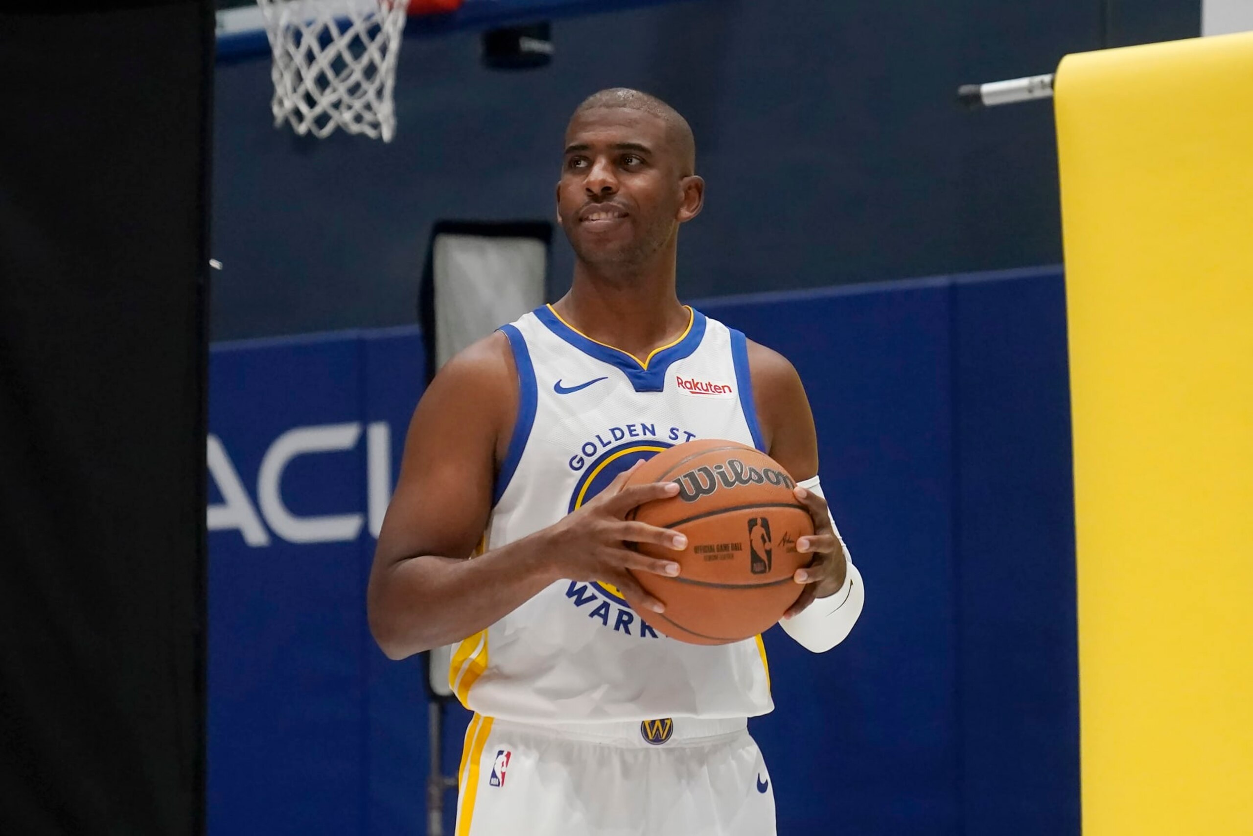 Golden State Warriors' Chris Paul poses for photos during the NBA basketball team's media day in San Francisco, Monday, Oct. 2, 2023. (AP Photo/Jeff Chiu)
