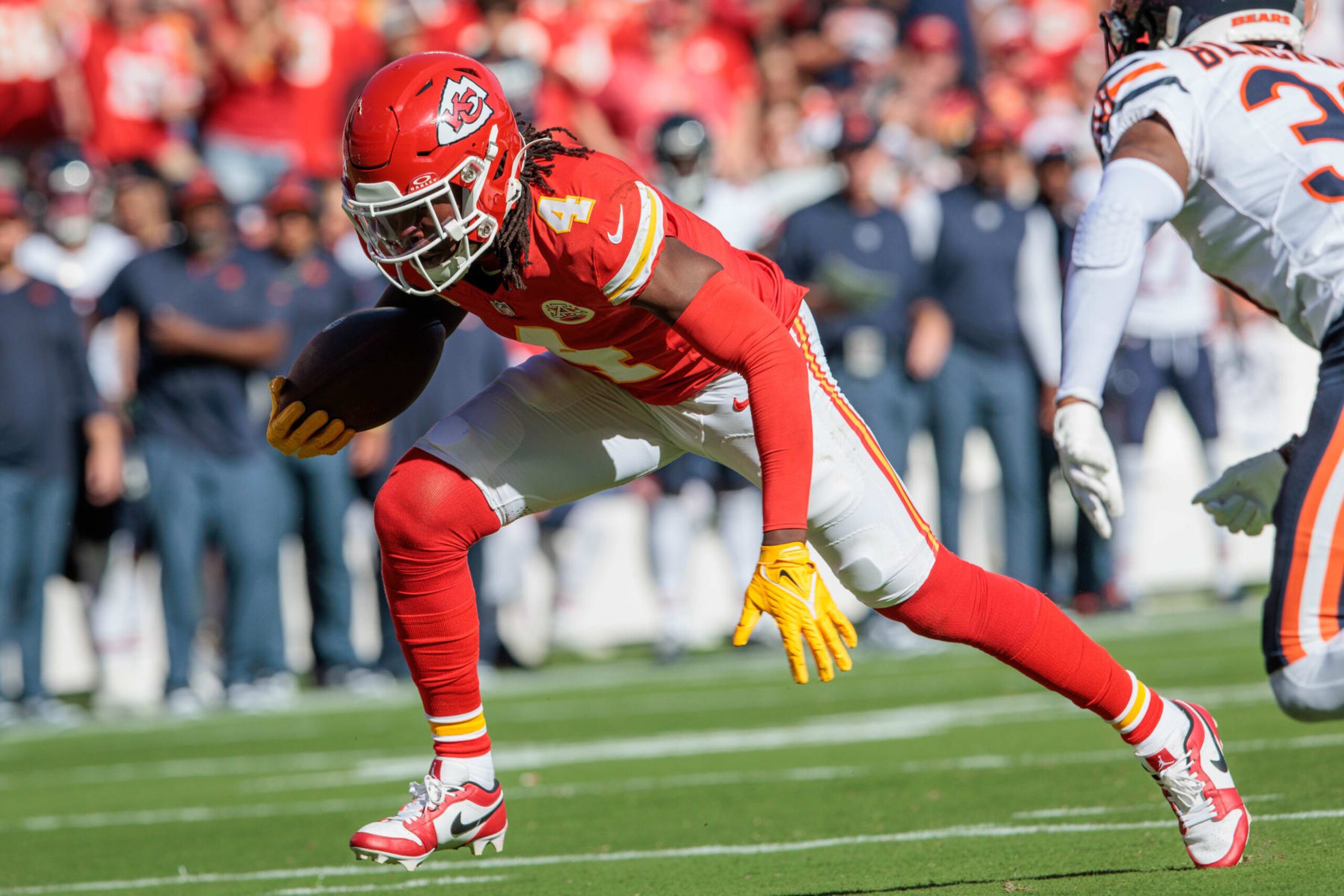 KANSAS CITY, MO - SEPTEMBER 24: Kansas City Chiefs wide receiver Rashee Rice (4) runs the ball after a reception during the first half against the Chicago Bears on September 24th, 2023 at GEHA Field at Arrowhead Stadium in Kansas City, Missouri. (Photo by William Purnell/Icon Sportswire via Getty Images)