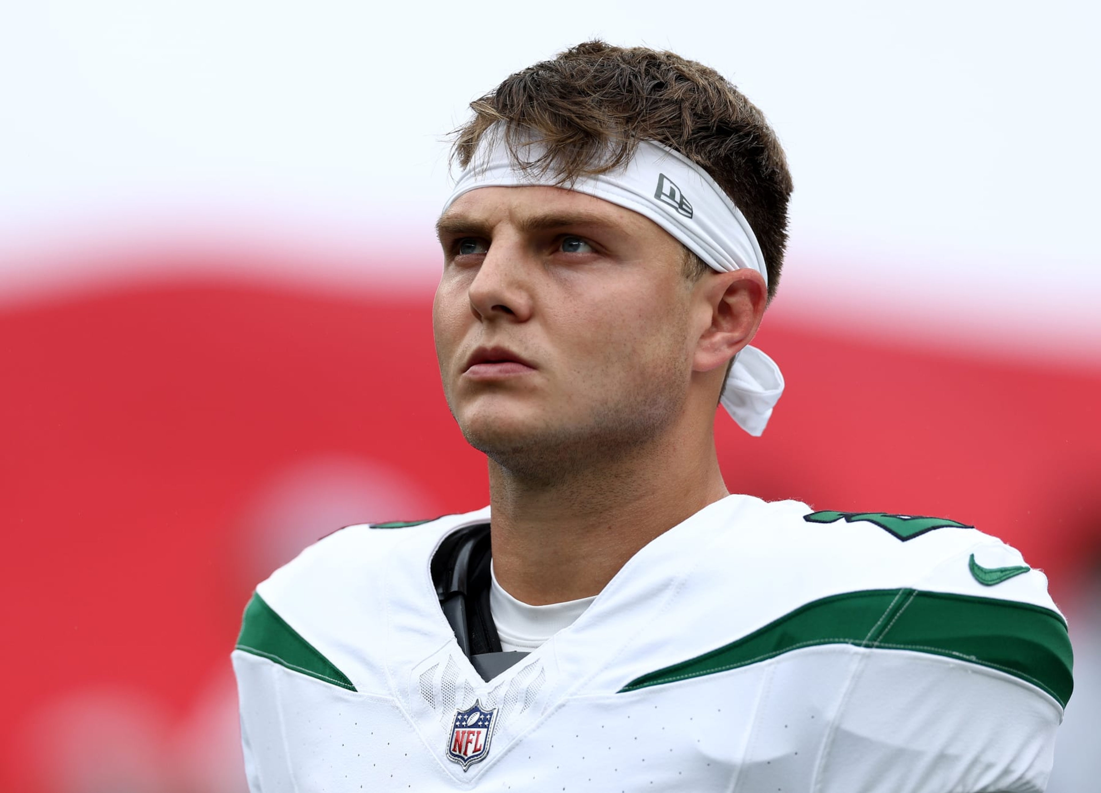 EAST RUTHERFORD, NEW JERSEY - SEPTEMBER 24: Zach Wilson #2 of the New York Jets stands on the field before the start of the game against the New England Patriots at MetLife Stadium on September 24, 2023 in East Rutherford, New Jersey. (Photo by Elsa/Getty Images)
