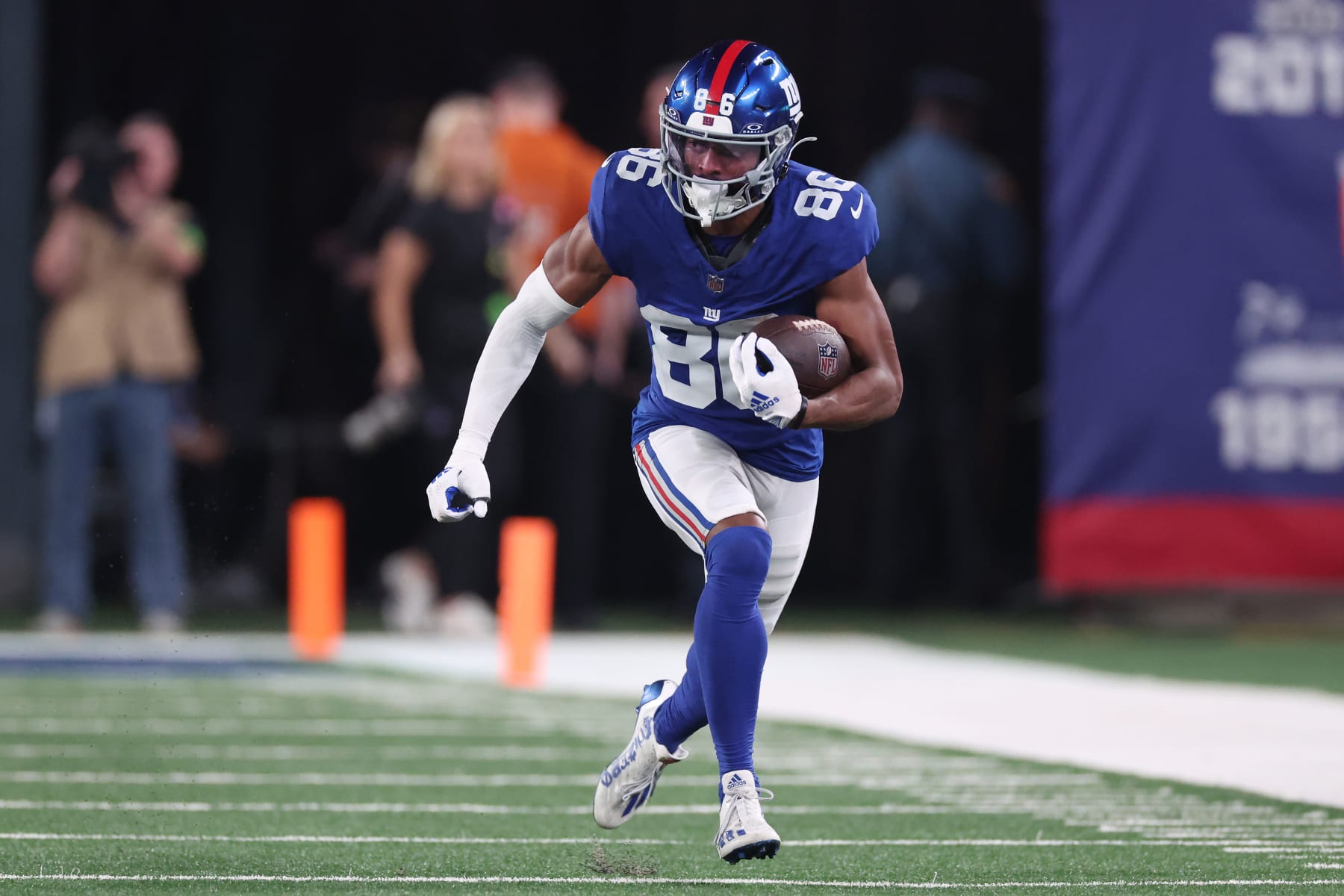 EAST RUTHERFORD, NEW JERSEY - OCTOBER 02: Darius Slayton #86 of the New York Giants runs the ball during the fourth quarter against the Seattle Seahawks at MetLife Stadium on October 02, 2023 in East Rutherford, New Jersey. (Photo by Al Bello/Getty Images)