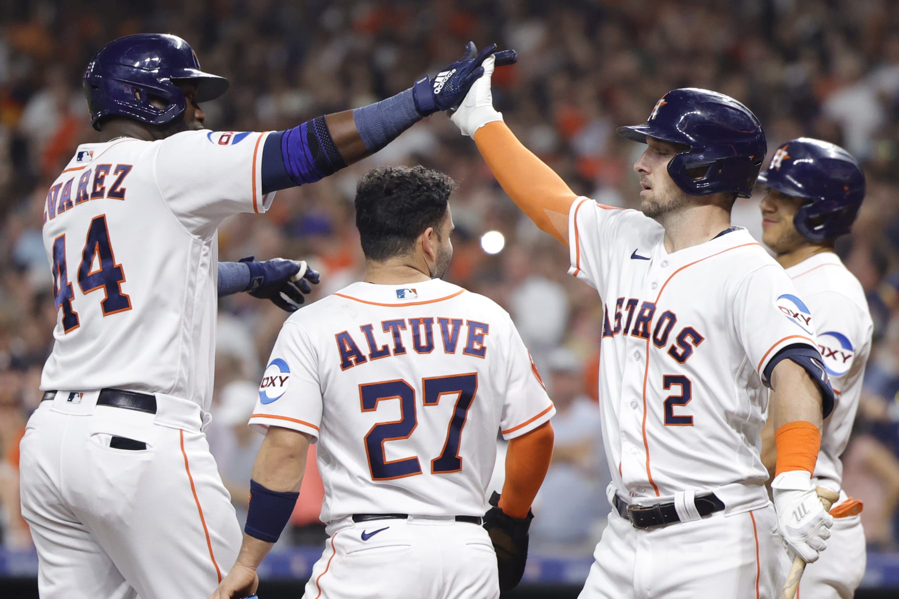 Yordan Álvarez (L), Jose Altuve (C) and Alex Bregman (R)