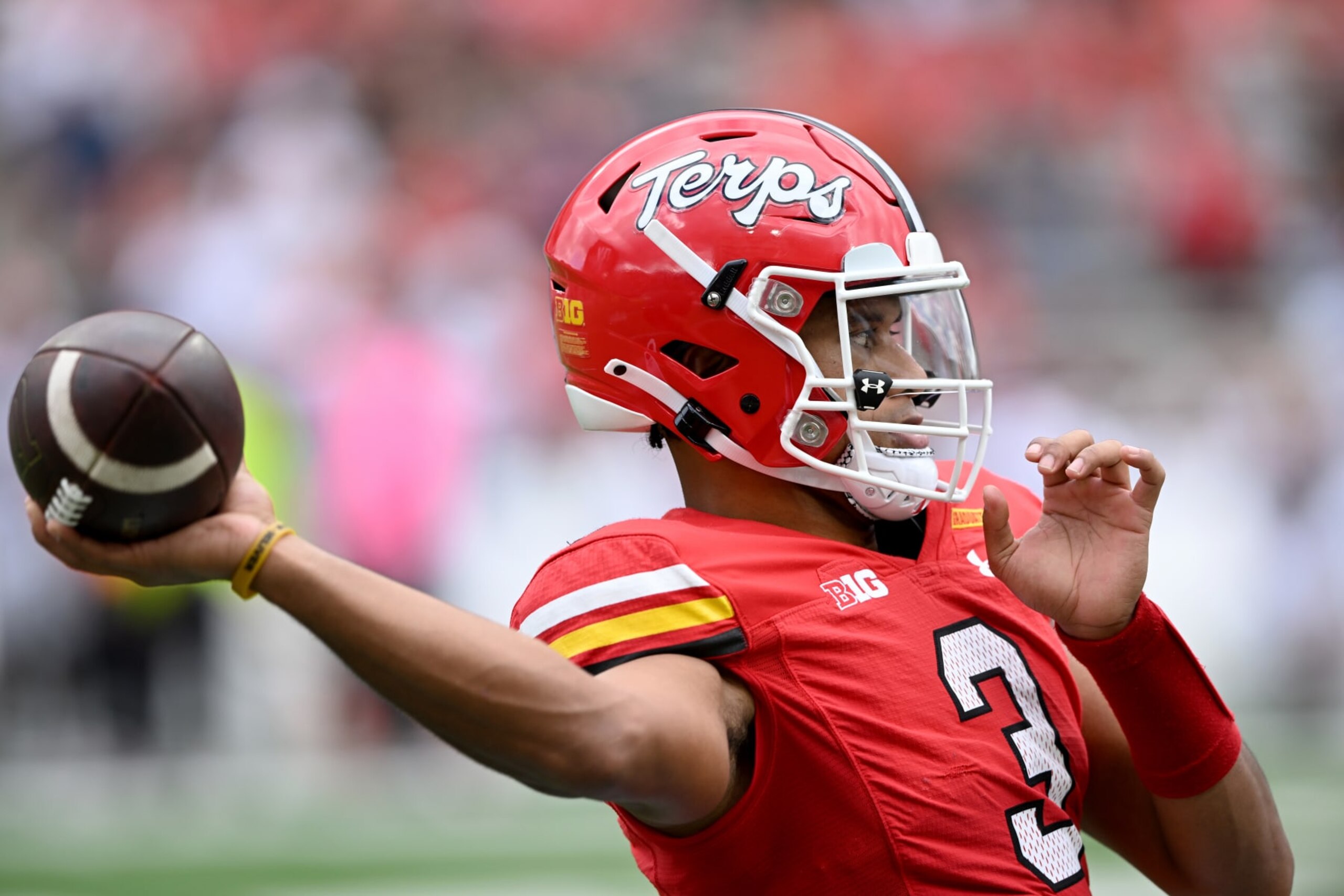 COLLEGE PARK, MARYLAND - SEPTEMBER 30: Taulia Tagovailoa #3 of the Maryland Terrapins warms up on the sideline during the game against the Indiana Hoosiers at SECU Stadium on September 30, 2023 in College Park, Maryland. (Photo by G Fiume/Getty Images)