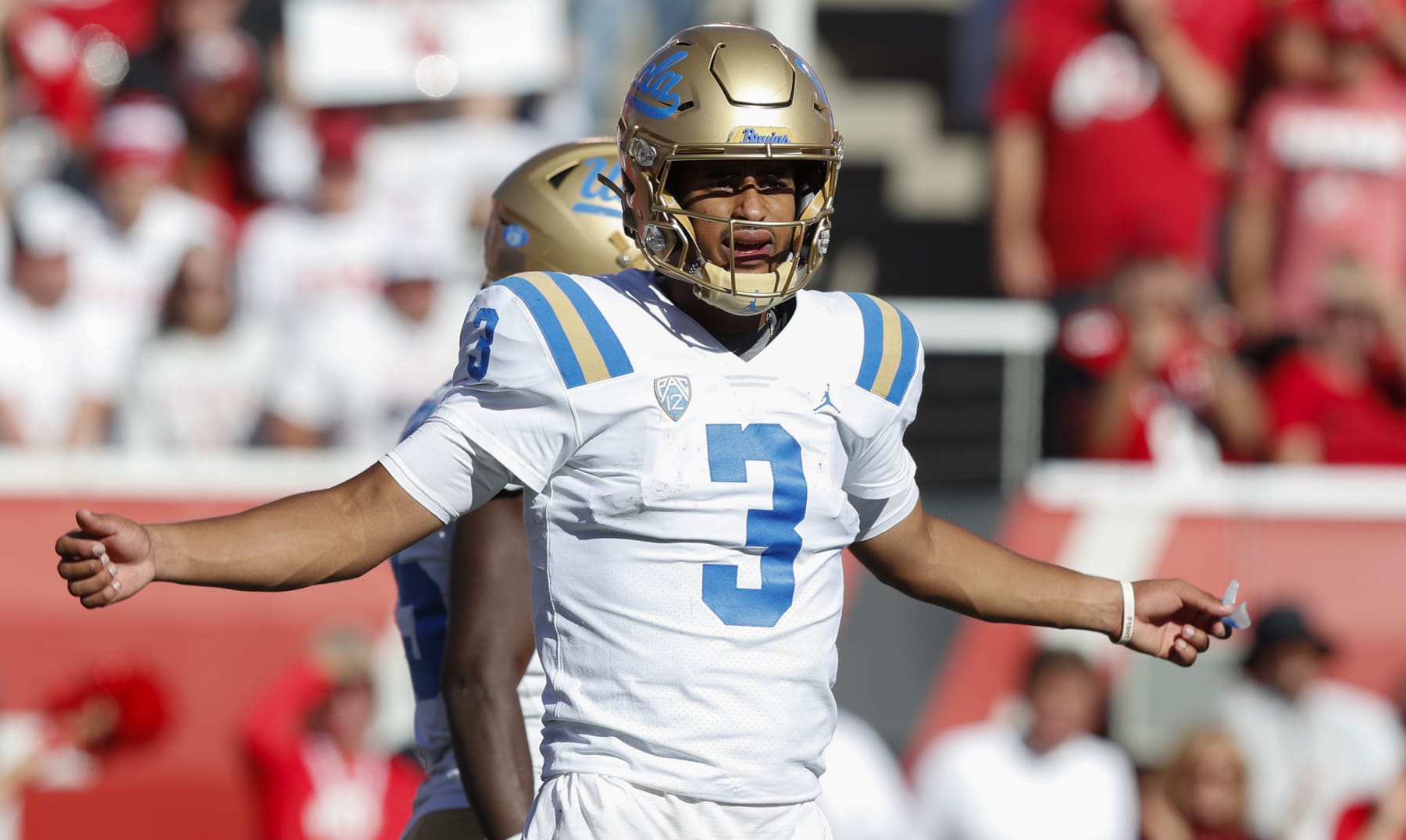 SALT LAKE CITY, UT - SEPTEMBER 23: Dante Moore #3 of the UCLA Bruins looks for a play to be called in during the second half of their game against the Utah Utes at Rice-Eccles Stadium on September 23, 2023 in Salt Lake City, Utah. (Photo by Chris Gardner/Getty Images)