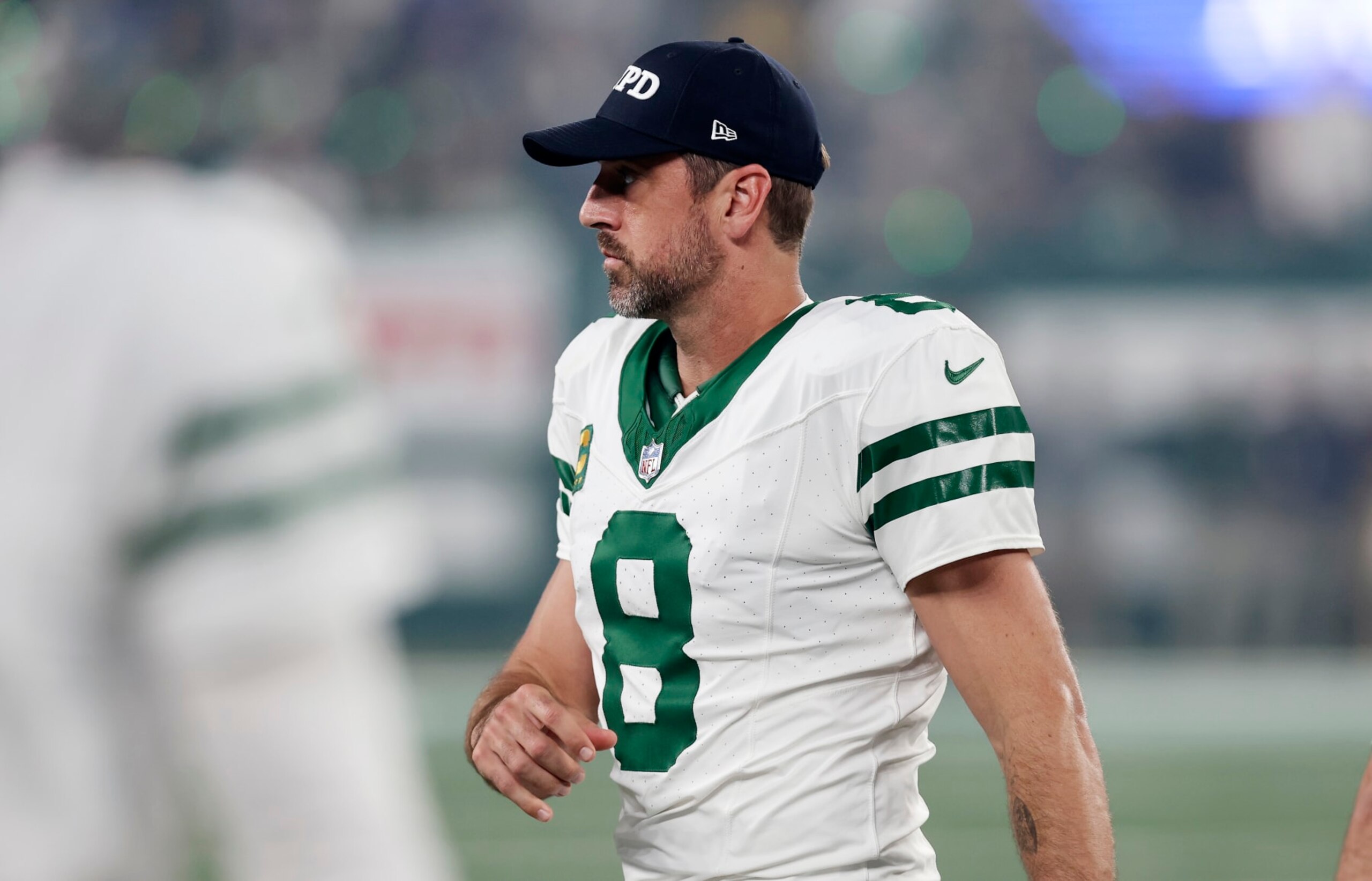 EAST RUTHERFORD, NEW JERSEY - SEPTEMBER 11: (NEW YORK DAILIES OUT)  Aaron Rodgers #8 of the New York Jets looks on before a game against the Buffalo Bills at MetLife Stadium on September 11, 2023 in East Rutherford, New Jersey. The Jets defeated the Bills 22-16 in overtime. (Photo by Jim McIsaac/Getty Images)