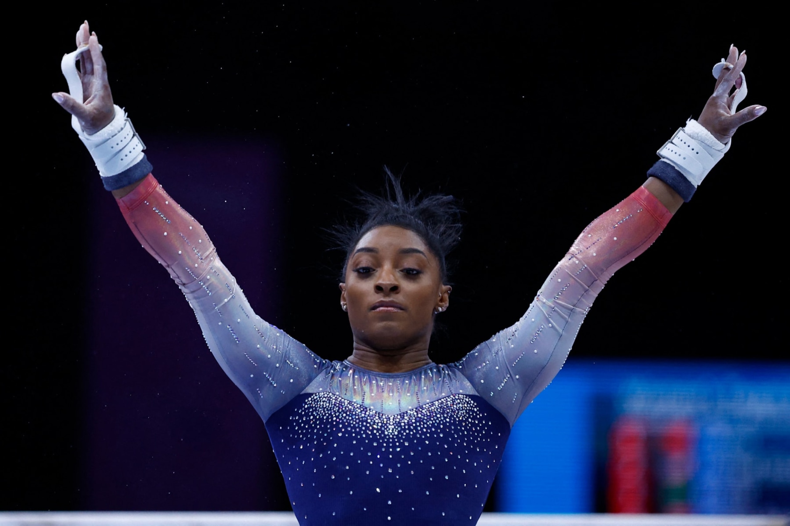 US' Simone Biles competes on the Uneven Bars in the Women's Team Final during the 52nd FIG Artistic Gymnastics World Championships, in Antwerp, northern Belgium, on October 4, 2023. (Photo by KENZO TRIBOUILLARD / AFP) (Photo by KENZO TRIBOUILLARD/AFP via Getty Images)