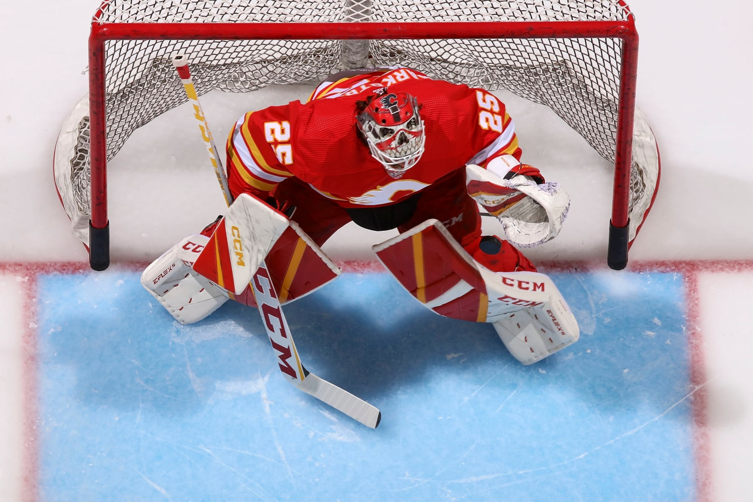 CALGARY, AB - APRIL 10: Jacob Markstrom #25 of the Calgary Flames in net for warmup prior to the game against the Nashville Predators at Scotiabank Saddledome on April 10, 2023 in Calgary, Alberta, Canada. (Photo by Gerry Thomas/NHLI via Getty Images)