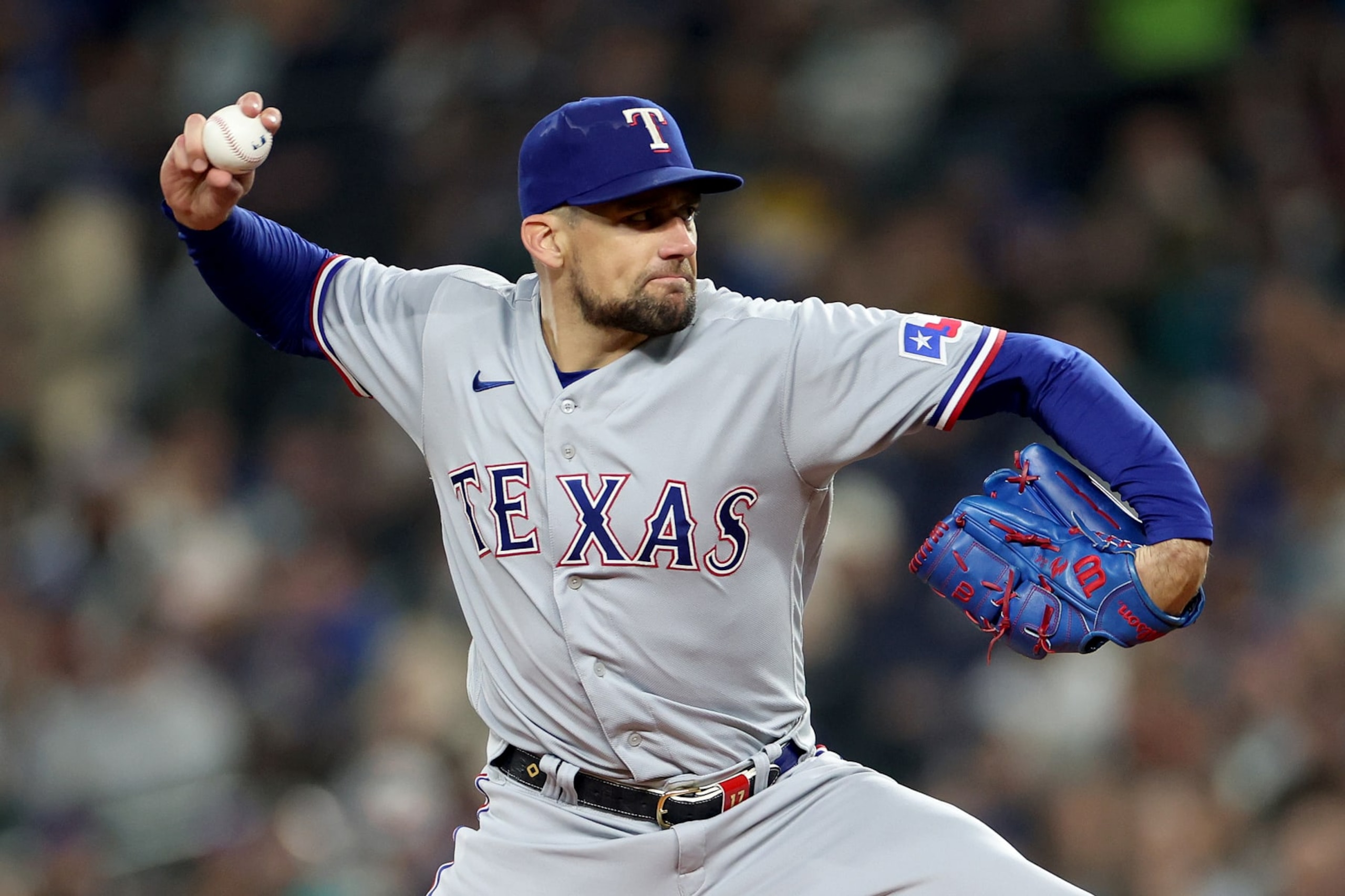 SEATTLE, WASHINGTON - SEPTEMBER 29: Nathan Eovaldi #17 of the Texas Rangers pitches during the first inning against the Seattle Mariners at T-Mobile Park on September 29, 2023 in Seattle, Washington. (Photo by Steph Chambers/Getty Images) SEATTLE, WASHINGTON - SEPTEMBER 29: Nathan Eovaldi #17 of the Texas Rangers pitches during the first inning against the Seattle Mariners at T-Mobile Park on September 29, 2023 in Seattle, Washington. (Photo by Steph Chambers/Getty Images)